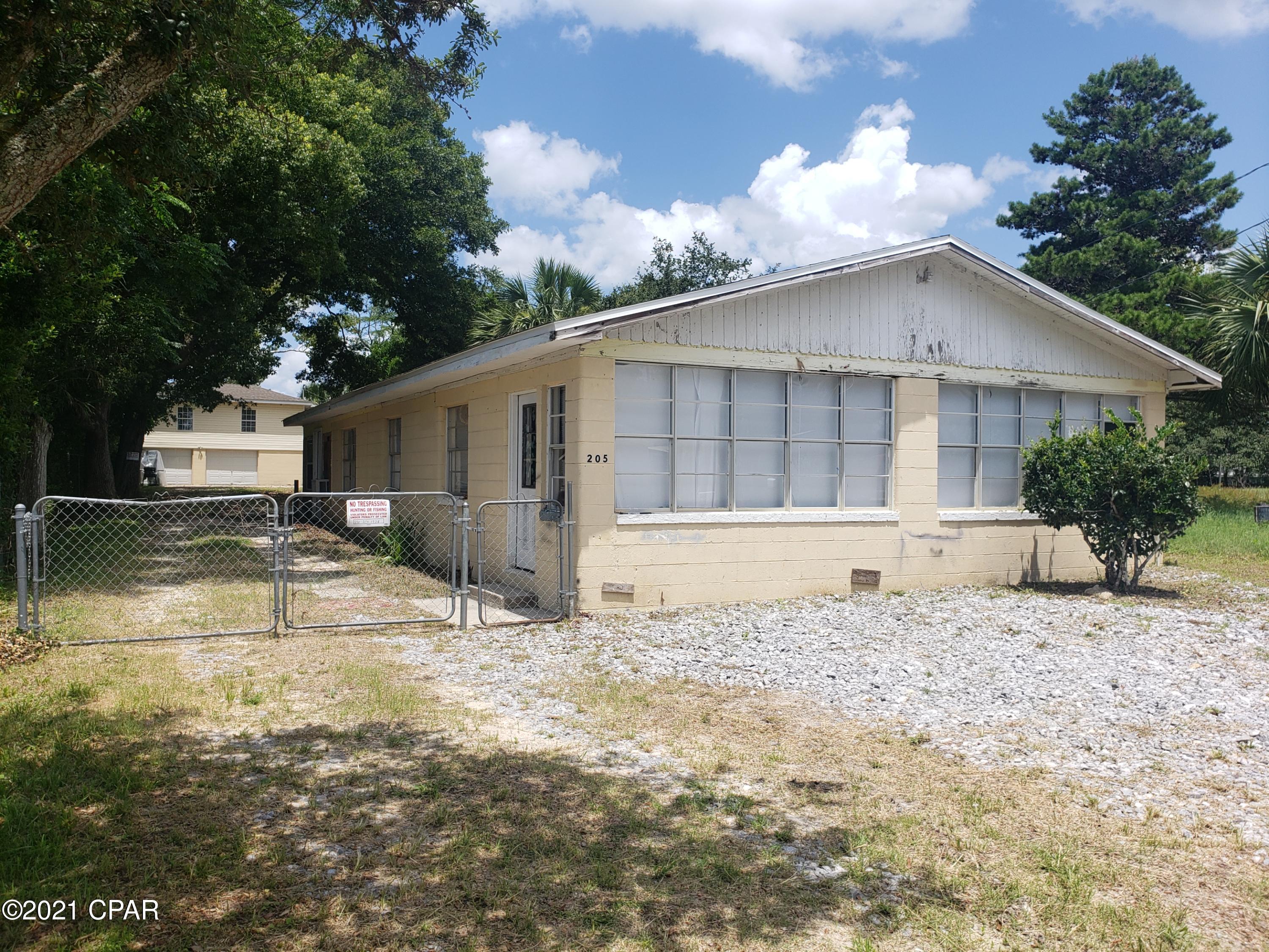 ***Multiple offers exist. Highest and Best offers due by 5pm on Monday, 7/19/21*** FANTASTIC opportunity to own 3 rentals within a 2 block walk to the beach. There is a 2 bedroom 1 bath apartment over the Detached garage that can be rented right away. The house in the front is a 2 bedroom 1 bath with the option to complete the addition of  a 1 bedroom unit in the back or the option to have 1 large  4 bedroom 2 bath rental house. There are several options for the Home owner or investor. You can live in the garage apartment  while you remodel the front house into vacation rentals or long term renter in the back and vacations rentals in the front, or all vacation rentals, or complete the remodel and flip. There is plenty of parking on this large lot to accommodate several cars with each location having their own parking area.  And lets not forget the double garage.