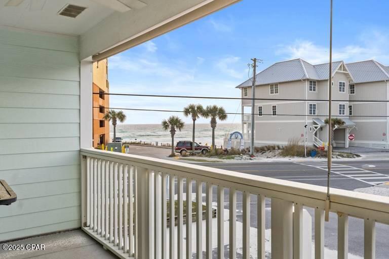 CLOSEST BUILDING TO THE GULF IN SOUTHWIND.  This one has great GULF VIEWS, sitting right at your front porch.   Upgraded and updated inside.  Currently a vacation rental and conveys FULLY FURNISHED and RENTAL READY.  Upstairs loft is open and airy.  Vaulted ceiling.  COMMUNITY POOL & PICKLEBALL COURT.