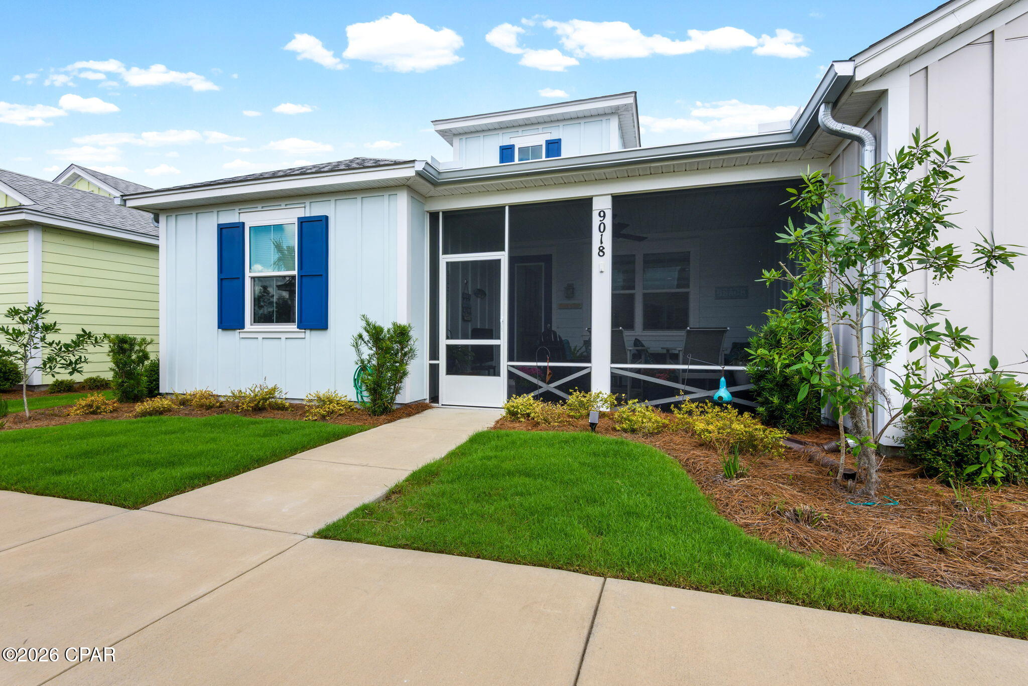 Welcome to paradise in beautiful Panama City Beach! Nestled in the highly sought-after Latitude Margaritaville Watersound community, this stunning coastal retreat offers the perfect blend of comfort, style, and resort-inspired living. Featuring a bright open-concept floor plan, spacious living areas, and designer finishes throughout, this home is ideal for both relaxing and entertaining. Enjoy a modern kitchen with upgraded appliances, generous bedrooms, and a private outdoor space perfect for morning coffee or evening sunsets. The home also includes impact windows and doors for peace of mind during hurricane season and a quiet home.  Whether you're looking for a full-time residence, seasonal getaway, or retirement retreat, this home delivers effortless Florida living at its finest. Residents enjoy world-class amenities including resort-style pools, fitness centers, pickleball and tennis courts, on-site dining, live entertainment, and a vibrant social atmosphere -- all just a short drive from the sugar-white beaches and emerald waters of the Gulf Coast. Experience the laid-back luxury lifestyle you've been dreaming of at 9018 Parrot Place -- where every day feels like a vacation.