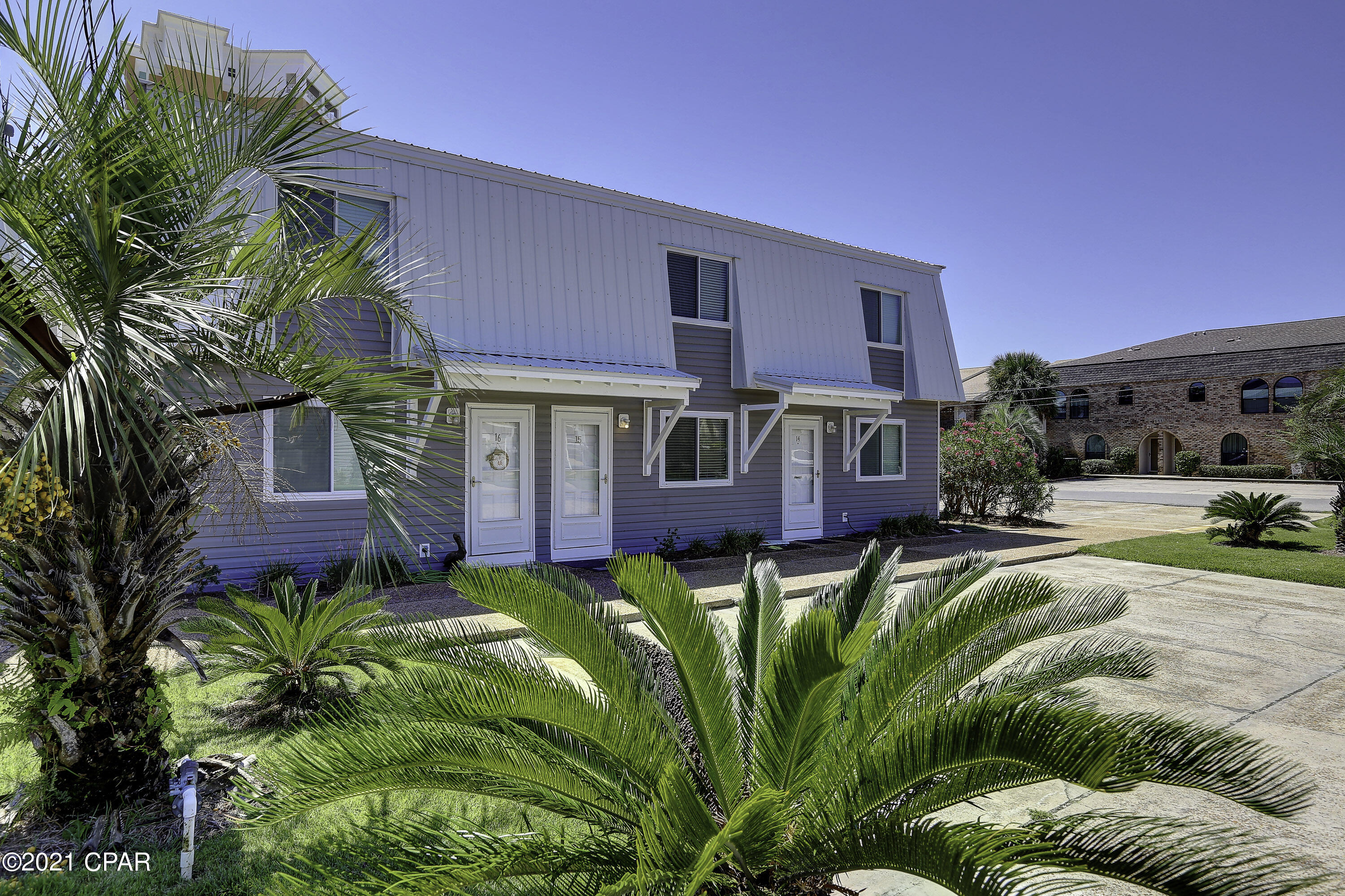 CURRENTLY UNDER CONTRACT, SELLER ACCEPTING BACKUP OFFERS. UPDATED and CHARMING beach condo just STEPS to private beach access! Capable of sleeping up to 8 people, this adorable and newly painted 2 bed, 1.5 bath condo is just what you've been looking for! New vinyl plank flooring throughout the entire condo for easy cleanup, gorgeous stone backsplash and granite countertops featured in the kitchen, and both bedrooms are tucked away upstairs allowing for extra peace and quiet. All appliances (except dishwasher) purchased in Spring 2021. Lighting, toilets, faucets (except tub), glass doors on shower, and blinds are less than six months old. Living room and dining furniture including sleeper sofa, beds, and decor purchased in Spring 2021. All exterior doors and impact-resistant windows were re on the east end of PCB, you'll enjoy small neighborhood life, private beach access, easy parking with two spaces for the unit, and a community pool. Fully furnished and rental ready!! Don't miss out, give us a call TODAY!