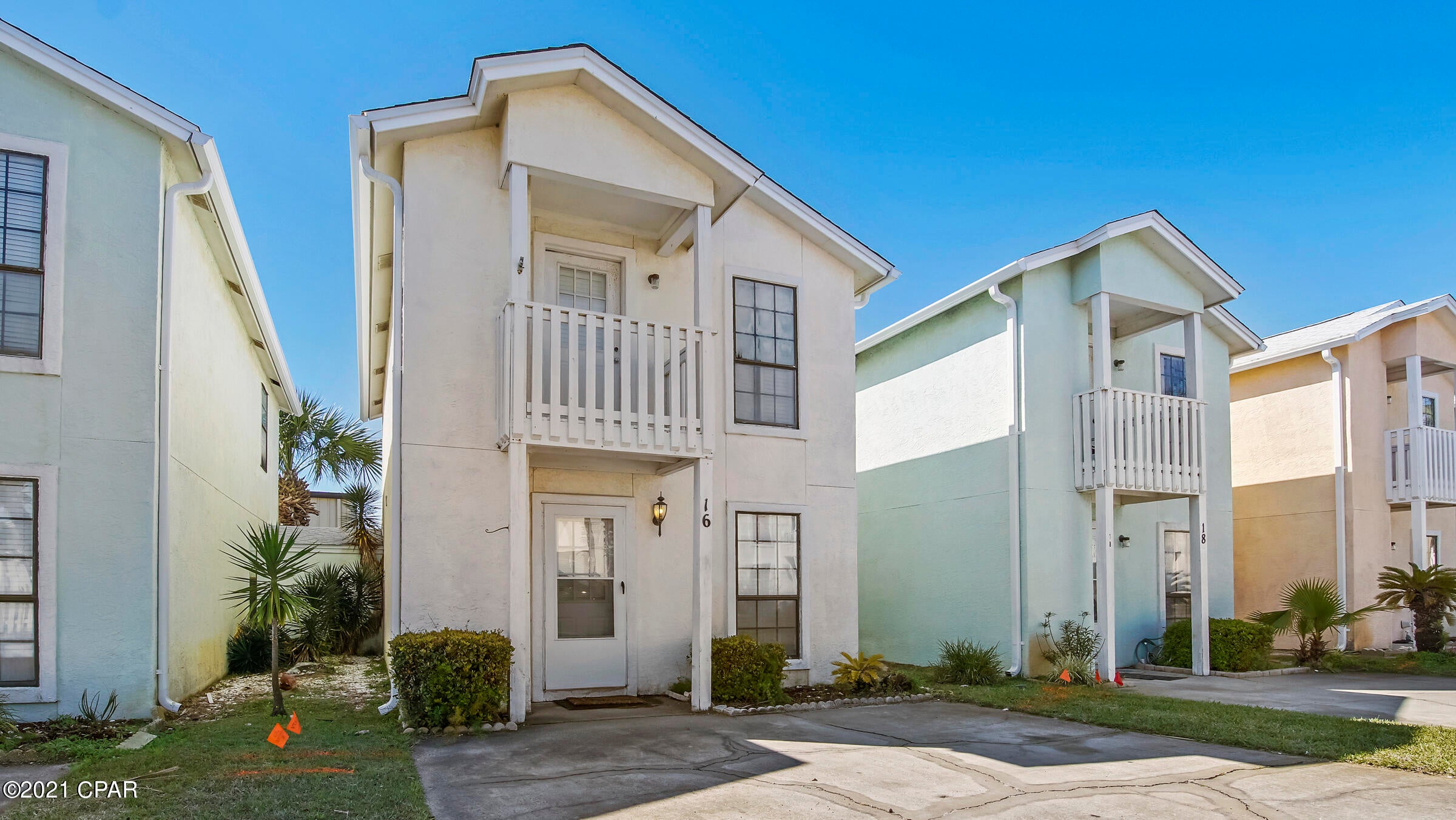 New roof was installed late 2019, with average $30K potential income projection 2 Bedroom 2½ Bath, just a Short Walk Across the street to the White Sandy Beaches and Emerald Water of the Gulf of Mexico. The unit Features a large kitchen with Plenty of Cabinet & Counter Space, with breakfast bar, Laundry Room with Washer & Dryer, Dining Area, Spacious living room with custom built ins, Enclosed Sunporch, Fenced in Back Porch and Outside deck off the front Bedroom. This Small Complex includes 2 Pools, a Club House & Low Homeowners Fee. Located on the Popular West end of the Beach. Close to Pier Park, Shopping & Dinning. These units do not come on the Market Often. All ages, measurements and room sizes approximate. Please verify if important.
