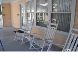 First-floor unit overlooking the pool in Peachtree Place II! This is a 2 bedroom, 2 bath end unit, completely furnished. Great open-floor plan and there is a large covered front porch and the back patio is also covered and you can access through both bedrooms. The pool is just steps from the unit and if you want to hit the beach, access is across the street. You're also just a 5 minutes drive from Pier Park. Great beach getaway in a quiet complex. All info is approx. and must be verified by Buyers if important.
