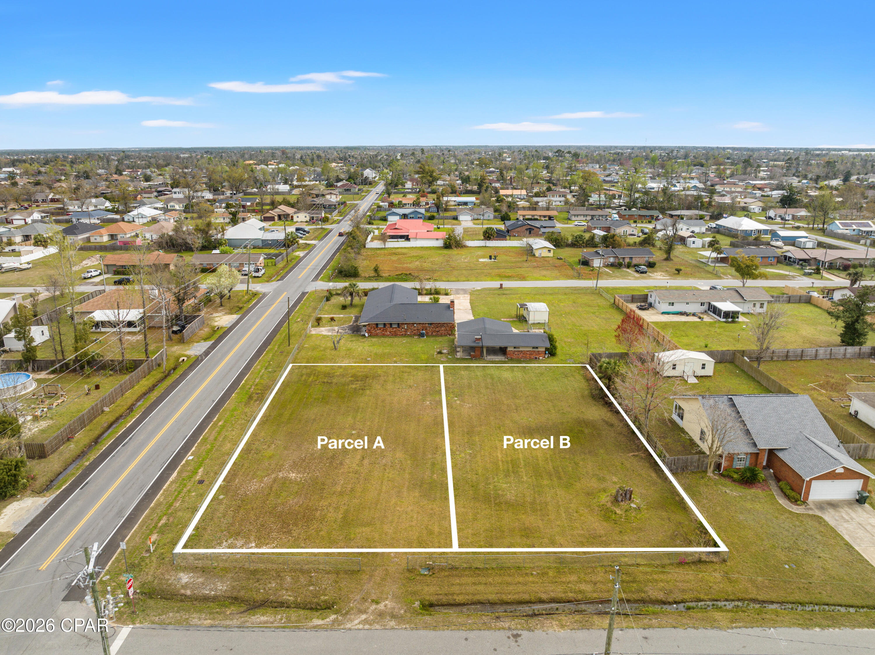 0.26-acre corner lot (Parcel A in Photos) in Lynn Haven. Cleared and build-ready with paved frontage. Utilities nearby. Flood Zone X. No HOA. Near public bay access. 

This 0.26-acre residential corner lot in Lynn Haven offers a cleared, build-ready site with defined boundaries. Positioned at the corner of Arkansas Avenue and 12th Street, this homesite provides flexibility for home design and orientation while maintaining primary access from Arkansas Avenue. Located in Flood Zone X, the property reduces common insurance concerns and supports a more straightforward path to construction.

The lot has been cleared and requires no site preparation. No soil or perc testing has been completed. Buyers should verify any requirements based on their intended build. Utilities, including electric, public water, and sewer, are available nearby. Buyers should confirm connection points, distances, and applicable impact or tap fees with the City of Lynn Haven. The cleared condition and layout make this a practical option for new construction without additional site work.

Zoned for residential single-family use, this parcel supports a range of build options for both end users and builders. Based on available information, typical Lynn Haven setbacks may apply, such as approximately 25 feet front, 10 feet sides, and 20 feet rear, though all requirements should be independently verified before planning.

The property is located within Lynn Haven city limits with convenient access to Highway 77, shopping, dining, and daily services. Public access to the North Bay and nearby shoreline areas, including Leslie Porter Wayside Park, is approximately a 4-minute drive, which adds to the appeal for buyers seeking proximity to outdoor recreation and water access.

The property is offered as-is. This parcel is one of two similarly sized lots created from a larger parcel, each listed separately.