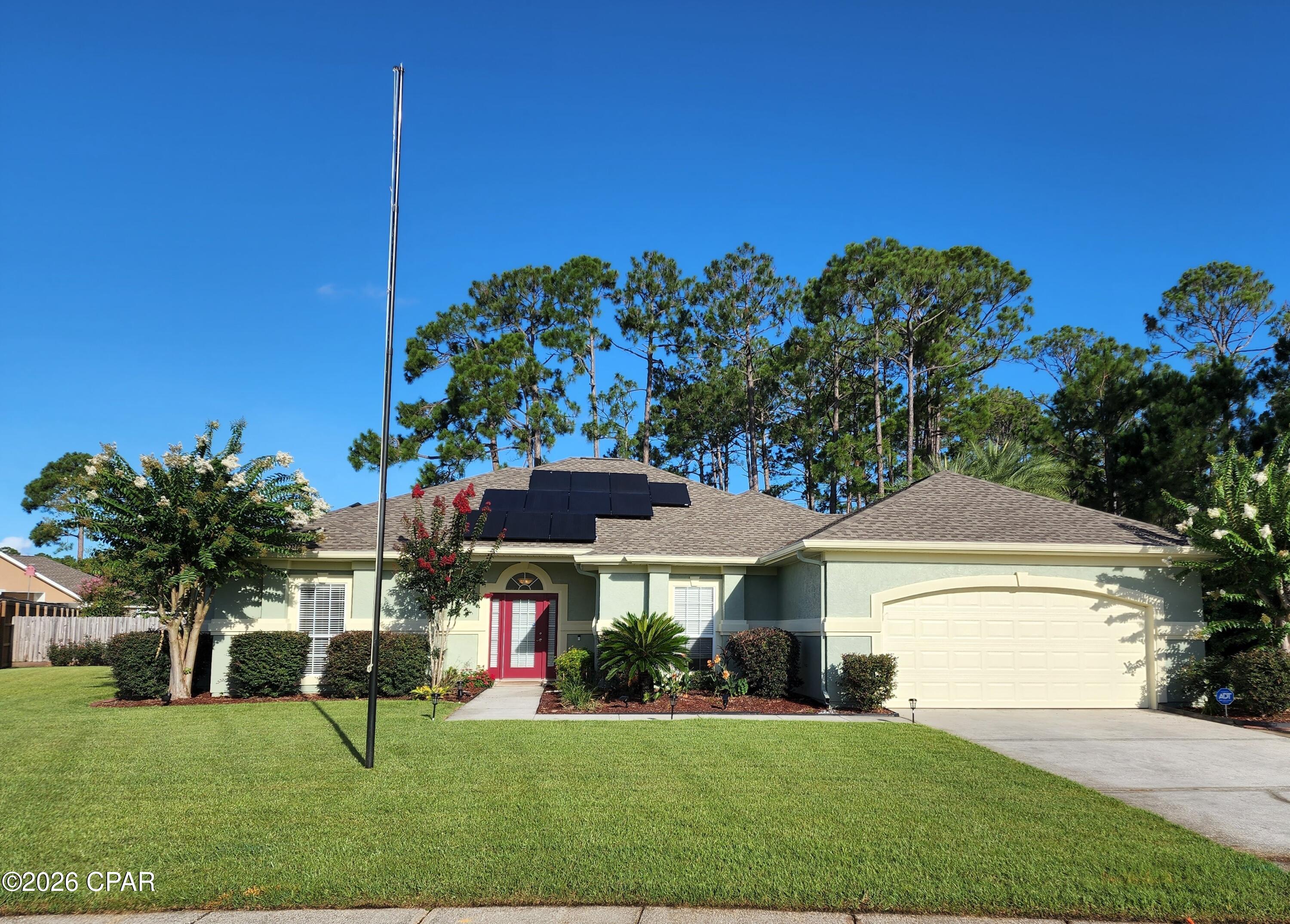 North Colony Club Estates - POOL HOME - Gorgeous 3 bedroom, 2 bath home with large fenced back yard for entertaining. This spacious home features living room with electric fireplace, formal dining room, kitchen with island and all stainless steel appliances, breakfast nook and two car garage. Guest bedrooms feature a Jack and Jill bathroom. Master suite has open area for an office or sitting area. Master bathroom features 2 walk in closets, stand alone shower and double vanities. Covered patio flows to in-ground pool with large pool deck for enjoying the sunny days. Property backs up to wooded area for privacy. Home is equipped with solar panels (significant savings on electric bill), tankless gas water heater and GENRAC whole house generator. Driveway features large parking pad for RV or boat. Pool service, lawn service and quarterly pest control provided. ADT alarm system available at tenant's expense. Sprinkler system on same meter as house. Home is in a flood zone (flood elevation certification on file). Pets allowed ( 2 small dogs under 25lbs) with $25 month pet rent, $50 pet fee, $250 pet deposit (per pet). TENANT OCCUPIED UNTIL 9/30/26.
