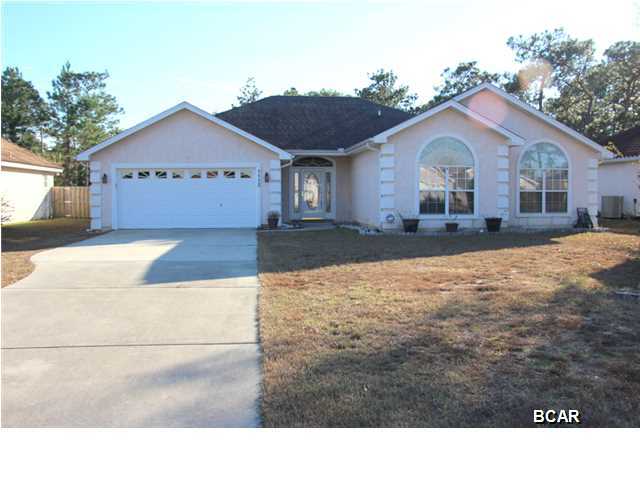 Fantastic 4 bedroom/ 2 bath home close to TAFB boasting 2422 sq ft is sure to impress, located on a quiet cul-de-sac with sidewalks! This split bedroom home features a large living room with fireplace, plenty of storage, eat in kitchen with custom cabinets and granite countertops, formal dining area with bay window and hardwood floors, master bedroom with trey ceiling, master bath with double vanity, garden tub, separate shower and HUGE walk in closet. Additional extras include enclosed sunroom, gutters, sprinkler system, privacy fenced yard, backyard storage shed, brick patio and above ground pool. All measurements, sizes, and ages are approximate, please verify. This Wont Last Long! NOT in a flood zone.