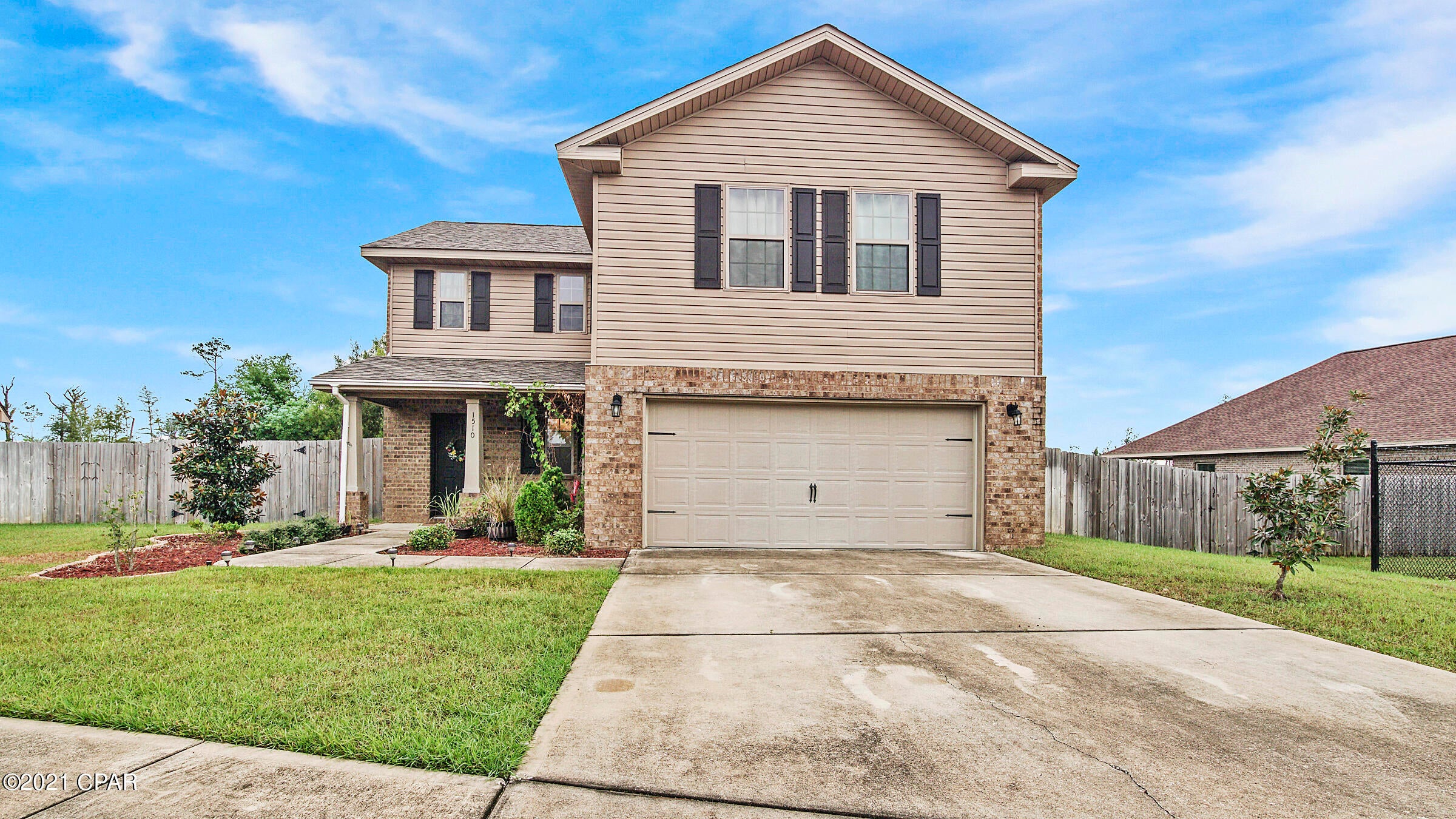 Great 4 bed/2.5 bath floorplan located in the Lynn Haven Wateroak subdivision.This 2-story floorplan features an open floor concept with a half bath and coat closet as you enter the home, that then opens into the living room/dining and kitchen area. Kitchen offers granite countertops, beautiful decorative backsplash, pantry and includes appliances. Additional storage can be found under the stair well. Upstairs features all bedrooms, with a large double-vanity hall bath, as well as dedicated laundry room. Master features crown molding with spacious double vanity ensuite with seperate shower/tub and walk-in closet. Backyard is fully fenced and offers double-gated access. No HOA and located just minutes to many of Lynn Haven's city park ammienites/top-rated schools. All sizes/measurements are approximate; please verify if important!!