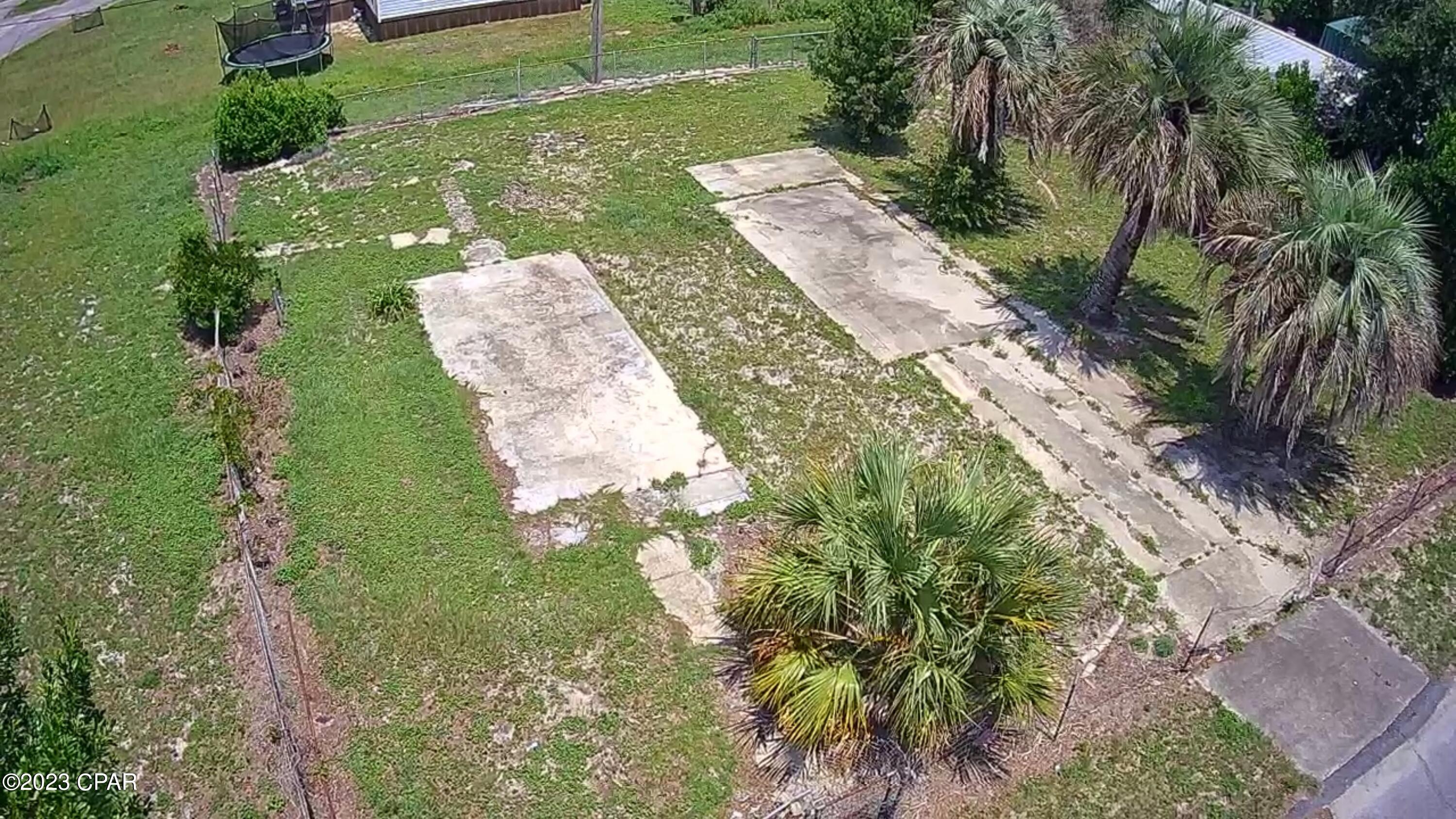 Are you ready to seize a golden opportunity to own a piece of land in one of the most sought-after locations in Panama City? We are delighted to present this exceptional corner lot, strategically situated between King's Ranch and King's Point, offering a unique blend of convenience, accessibility, and natural beauty. Just 7 minutes to the pretty Bayou Boat ramp and within 1 mile of the water you will find this already developed property ready for your dream home or investment property. Zoned for a mobile home or detached single family and already has public utilities on site! Don't miss your opportunity to purchase an affordable property in a prime location.