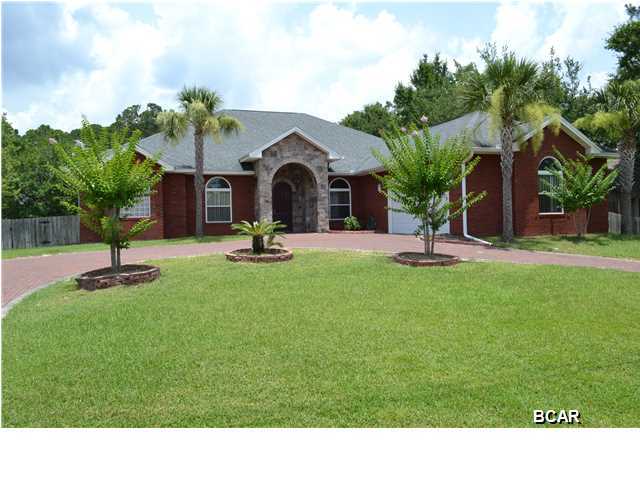 2006 ALL BRICK WATERFRONT HOME WITH IN-GROUND POOL!! The interior of this custom built home features 5 bedrooms, 4 full bathrooms, an open floor plan with split bedrooms, 10' ceilings, bull nose corners, a gourmet kitchen, a wet bar, a breakfast area, a formal dining room with custom faux painting, a gas fireplace, an XL laundry room with counter and cabinets, decorative step and tray ceilings, ample heated/cooled storage and upgrades galore. The kitchen boasts granite counter tops, an XL wrap around breakfast bar, solid wood cabinets, an 8x5 walk-in pantry with automatic light, cabinets to the ceiling, XL drawers, stainless steel appliances, self retracting drawers, built-in spice racks and a water spigot above the stove for easy water access. The appliances include 3 dishwashers, a