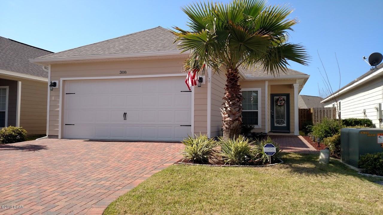 This is a beautifully maintained home in the Turtle Cove subdivision.  Open and airy floorplan gives you that feeling of space with the vaulted ceilings in the living area.  The kitchen boasts great storage with plenty of cabinets and a pantry.  All of the stainless steel appliances are staying.  Easy maintenance on the floors as there is tile almost throughout. Only the bedrooms are carpeted.  The master suite is located at the back of the house and offers plenty of privacy, plus a walk in closet, en suite bath with tub and separate tile shower, dual vanities.  The other two bedrooms share a bath in between and are nicely sized.