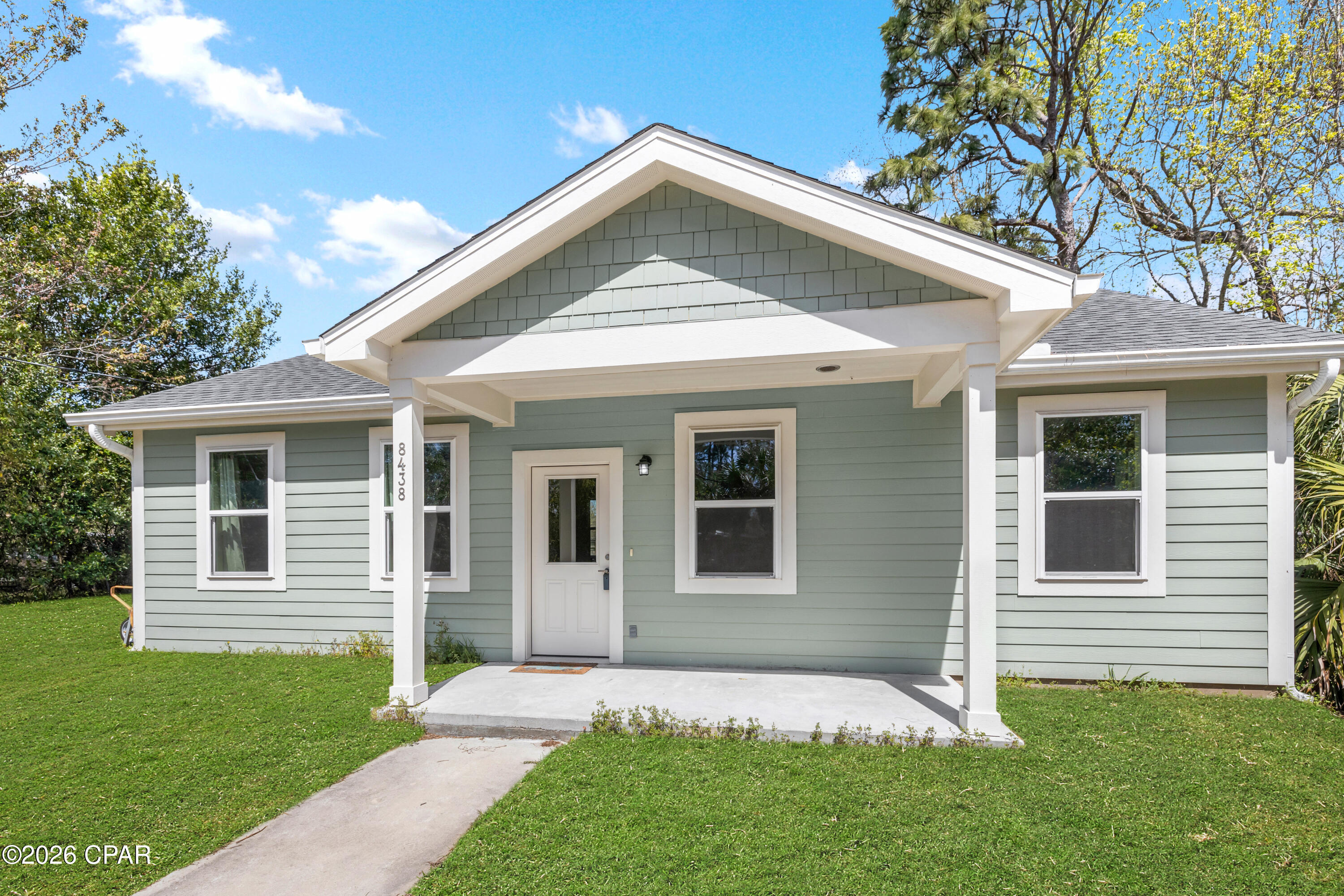 NO HOA | 2022 CONSTRUCTION | UNDER $300K IN PANAMA CITY BEACH
Built in 2022 by Rebuild Northwest Florida, this clean and move-in ready 2-bedroom, 2-bath home offers a rare opportunity to own a detached single-family home in Panama City Beach under $300,000. Situated on a 0.23-acre interior lot with a fenced backyard, the property also features a long driveway with ample parking.
Inside, you'll find LVP flooring throughout, grey shaker-style cabinetry, and white kitchen appliances, with the washer and dryer included. Wider interior doorways enhance accessibility and improve overall flow throughout the home. The open layout provides efficient use of space while maintaining a clean, modern feel.
The property is connected to city water and utilizes a septic system, offering a practical combination of utility services.
Located in Flood Zone X, flood insurance is not required, and newer construction homes like this often benefit from more affordable homeowner insurance options compared to older properties. With no HOA and minimal restrictions, this property offers flexibility that is increasingly difficult to find in this price range within Panama City Beach.
All information is deemed reliable but not guaranteed; buyer to verify if important.