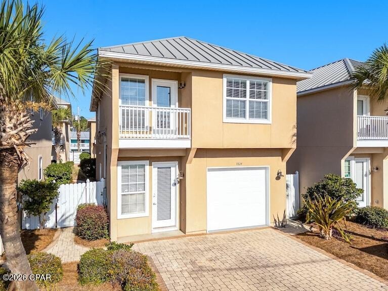 Just steps from the sugar-white sands of Panama City Beach, this income-producing vacation rental offers the location, amenities, and guest capacity that make a beach investment stand out. Currently operating as Palm Breeze Retreat, this 3-bedroom, 2.5-bath property is completely furnished, accommodates up to 10 guests and is positioned within the Villas of Panama, where the community pool and nearby beach access put vacation favorites within easy reach.

Inside, the main living area provides plenty of room to gather after a day on the Gulf, with a comfortable living space, dining area, and fully equipped kitchen featuring stainless steel appliances, stone countertops, and ample cabinetry. The sleeping arrangements are designed with groups and families in mind, including a primary suite with a king bed and twin-over-twin bunks, two additional queen bedrooms, and a sleeper sofa in the living area. Multiple bedrooms offer balcony access, while the primary suite includes its own bath.

One of the property's most memorable features is the converted garage game room, giving guests their own place to unwind with arcade games, air hockey, darts, basketball, and more. Outdoor spaces add even more appeal, with balconies, a lower-level patio and grill area, and a second-floor balcony overlooking the community pool.

The location makes it easy for guests to enjoy Panama City Beach without spending the entire vacation in the car. Thomas Drive, St. Andrews Bay, dining, entertainment, and the beach are all nearby, while St. Andrews State Park is less than three miles away. Shopping, golf, charter fishing, water activities, family attractions, and the area's many restaurants provide plenty to explore beyond the shoreline.

Whether you're searching for a beach property to enjoy yourself, an established vacation rental to add to your portfolio, or a combination of both, this property brings together guest-friendly amenities and a highly desirable location just a short walk from the Gulf.