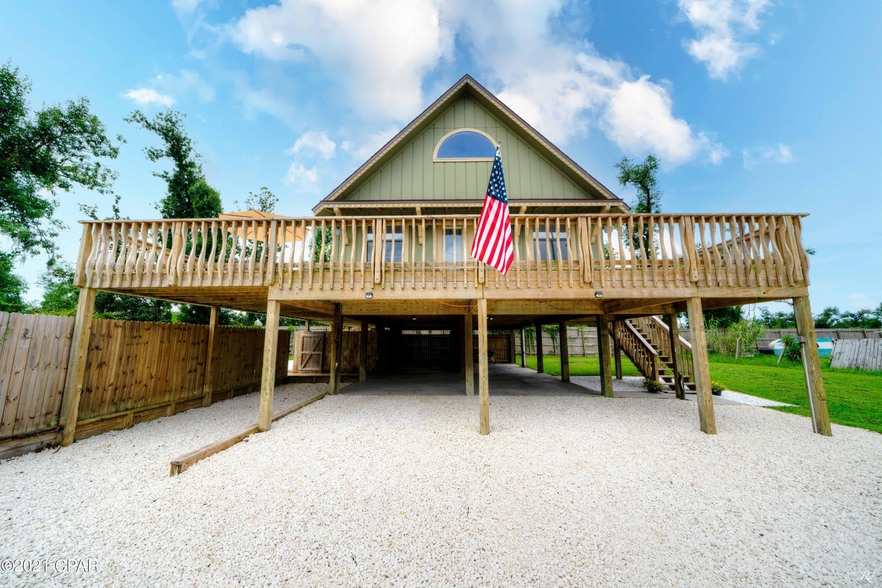 This beautiful 2 bed, 2 bath home is the perfect getaway from the city.  The wrap around deck has a great view of the entire area including Deerpoint Lake. The main living area has new LVP flooring and is an open concept space that is joined with the dining area and kitchen. The kitchen features tile floor and plenty of cabinet space. The master loft on the second floor has a beautiful view of the lake, two closet spaces and its own private bathroom. The master bathroom is equipped with tile flooring, a shower/tub combo, an updated vanity and plenty of space for storage.  The bonus area, which overlooks the living area, is the perfect space for an office or can be turned into another room. The large second bedroom shares a bathroom downstairs, which includes the laundry area and a stand-up shower. This home also features a private backyard area with a beautiful inground pool with freshly painted deck.  This is the perfect space for entertaining family and friends in the Florida sunshine. This home is located in a safe and quiet neighborhood in Deerpoint Lake with boat ramp access, schools, and grocery stores for your convenience! There is an easement in the back corner of the property to walk directly to the lake.  HIGHEST AND BEST DUE BY JULY 15TH AT 10:00am.