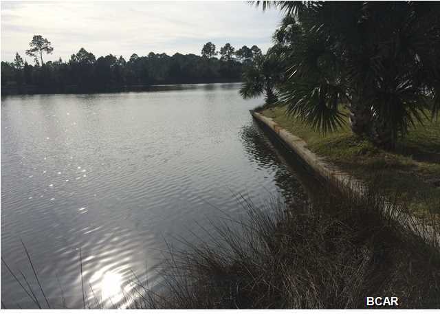 This home is right on Lynn Haven Bayou. The site offers direct deep water access to the bay and ultimately the gulf! Imagine having a dock, seawall, boat slip, oversized garage and lots of extra parking for all your toys! There is space for hobbies restoring cars, storing motorcycles or boats. The ground level also has two bonus rooms and a full bath with a double walk in shower for rinsing off after a long day out on the boat. Think of the possibilities with all that flexible space! The main house has a huge great room overlooking the Bayou and a large deck with plenty of room for entertaining. The fireplace just adds to the charm. The floors are laminate in the main living area. The master bedroom has a bay window and large walk in closet. Large deck overl;ooking the bayou and a