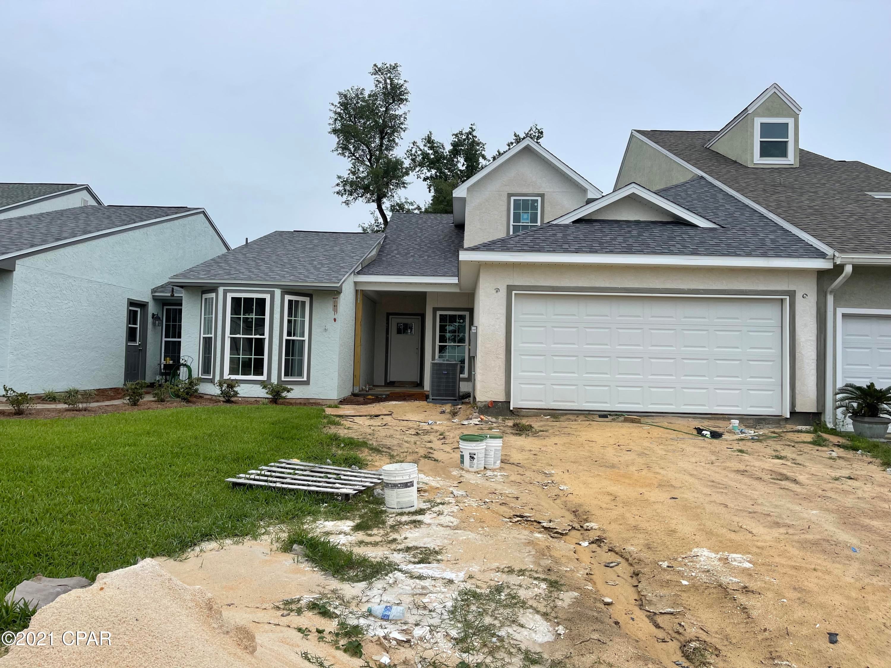 New Construction in Panama Country Club. This new build will include 4 bedrooms, 3 bathrooms, open living-dining-kitchen concept. The great room will include French doors leading to the covered back porch. The spacious ground-floor master suite will include double vanity, walk-in tile shower, and large walk-in closet. Both bedrooms on the 2nd floor include a walk-in closet.