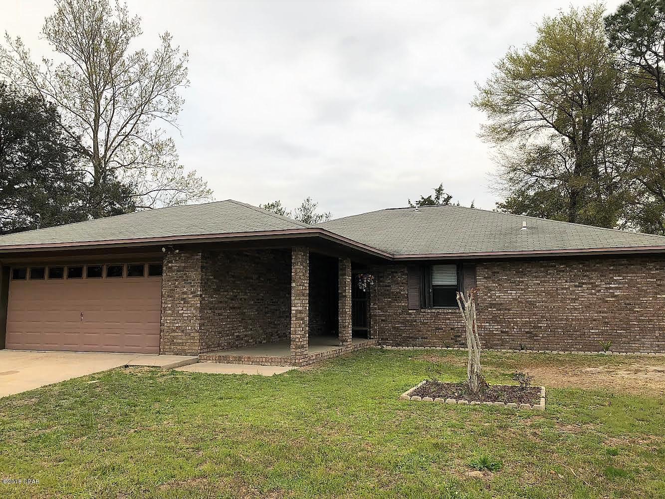Good central area of Bay County!  3 bedroom 2 bath, all brick house at the end of a cul-de-sac. Large fenced back yard with 2 storage buildings. Double car garage, separate dining room, fireplace and built-in bookcases, cabinets/shelving. New laminate floors in the main living areas, tile in the bathrooms and kitchen, and laundry room.  lots of closet and pantry storage! Call today for an appointment to see. Agent is related to owner.