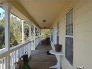 Lakeside Living! Features of this well kept home include 3 bedrooms, 2 baths, pretty views of North Spring Lake from the living/dining room and then a nice size workshop/storage. Natural landscaping keeps it easy to maintain. Perfect for a weekend get away or first time homebuyer. Call today to schedule your private showing.