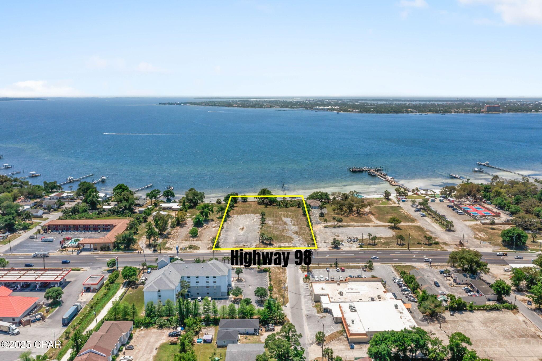 Exceptional opportunity to acquire 2.57± acres of prime commercial waterfront property, strategically located in Panama City. Zoned General Commercial, this site supports a broad array of development opportunities such as retail centers, professional office complexes, service businesses, wholesale sales, shopping plazas, and more. The zoning is designed to accommodate intensive commercial activity, making it ideal for developers or investors seeking a high-potential waterfront site in a growing market. Boasting a 2024 FDOT Average Daily Traffic Count of 41,500, this high-visibility site offers unparalleled access and exposure for a wide range of commercial ventures. Situated close to major regional landmarks including Hathaway Bridge, the Port of Panama City, Gulf Coast State College, and Florida State University's Panama City campus, this property sits at the crossroads of commerce, education, and infrastructure. Don't miss this rare opportunity to develop a high-impact commercial property in one of Panama City's most accessible and dynamic locations.