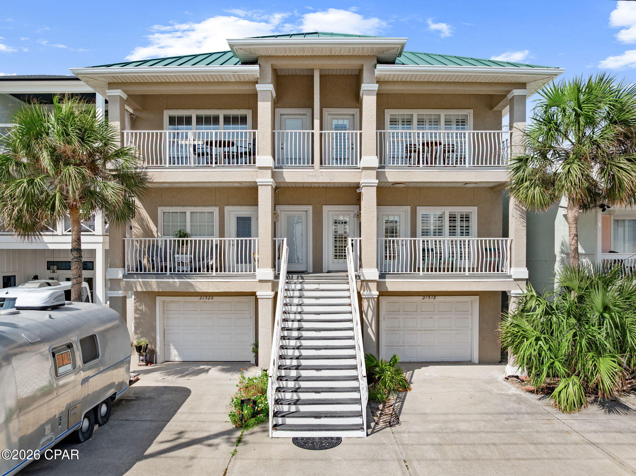 Coastal living meets investment potential at this spacious 4-bedroom, 4-bath beach home along Front Beach Road in Panama City Beach. Offering approximately 2,540 square feet across three levels, this property provides the space, location, and layout sought after by vacationers and short-term rental investors alike.

Enjoy Gulf views and easy access to the sugar-white sand just across the street. Multiple balconies provide outdoor spaces to take in the coastal surroundings, while the interior offers generous accommodations for guests, including multiple living areas and well-appointed bedrooms. An elevator adds convenience between floors, and the two-car garage provides valuable parking and storage--an added benefit for a beach property.

With short-term rentals allowed and no HOA, this property offers flexibility for investors looking to capitalize on Panama City Beach's strong vacation market or buyers searching for a second home with income-producing potential. Conveniently located near dining, shopping, entertainment, and everything the west end of PCB has to offer, this is an opportunity to own a versatile coastal property in a highly desirable location.

Tons of room to add a pool in the backyard too