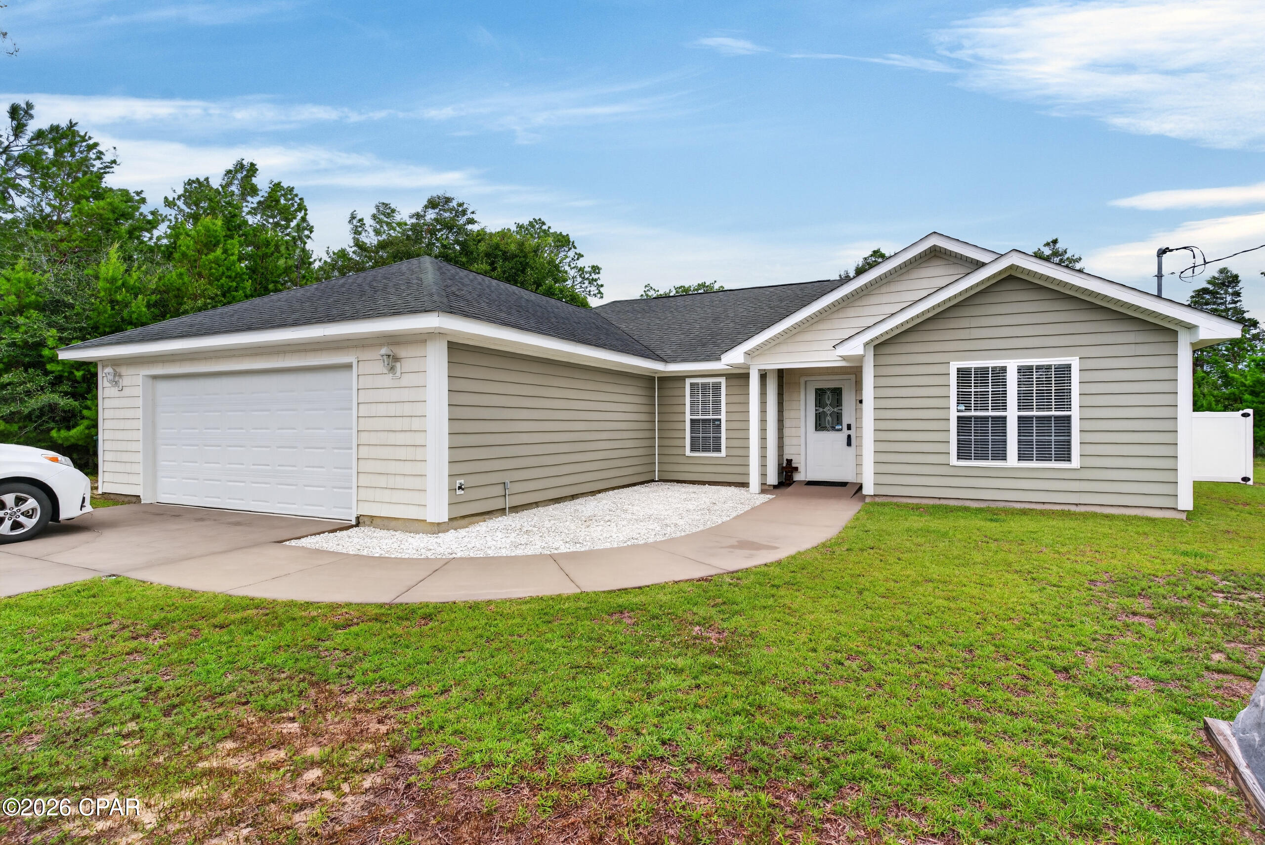 Welcome to this well-maintained home located in the desirable Sunny Hills community, offering comfort, functionality, and convenience. Situated on a 0.229-acre lot, this property provides a peaceful setting while still being within a reasonable drive to the beautiful white-sand beaches of Northwest Florida. One of the standout features of this property is the private well system, complete with a water softener, providing reliable water service and added convenience for everyday living. The home also includes a septic system, offering independence from city utilities and the benefits of having your own private systems in place. Inside, the home offers a comfortable layout with functional living spaces designed for everyday living. The floor plan provides a welcoming space to make your own while enjoying the quiet surroundings of Sunny Hills. Step outside and enjoy Florida living from the screened-in back porch, the perfect place to relax, entertain guests, or enjoy your morning coffee while taking in the peaceful atmosphere. The backyard also features a large detached shed that provides additional versatile space. This well-appointed structure is spray foam insulated and equipped with a mini-split system for heating and cooling, making it a comfortable year-round space for a workshop, hobby area, home office, storage, or whatever best fits your needs.
Located in Sunny Hills, this property offers a peaceful community setting with convenient access to outdoor recreation, local amenities, and the Gulf Coast beaches. Enjoy nearby lakes, parks, and nature while still being just a drive away from shopping, dining, and the beautiful beaches of Northwest Florida.
Don't miss the opportunity to own a home in Sunny Hills featuring a private well system, water softener, septic system, screened-in back porch, and a climate-controlled backyard building--all in a quiet community with the convenience of being close to everything Northwest Florida has to offer.