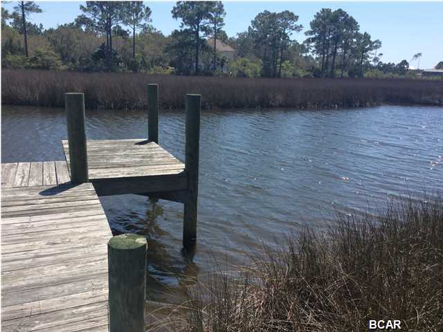 A sense of place...abundant waterway recreation where you can fish, reconcile with nature, feel the calm, the real and beautiful...come live your adventure. This 95' wide waterfront Gulf access lot includes a dock ready for your boat or catch Red-fish, trout, blue crab... right from your dock. .83 acre of land awaits your new dream home. No mobile homes. Come reconcile with nature ... 19 minutes from the main shopping street, groceries, restaurants, doctors... A very nice neighborhood, where people like you are in harmony with the outdoors....come close to what's real, come take a look... :)
