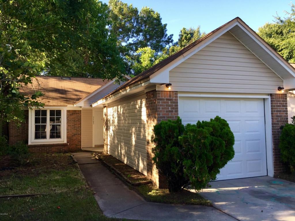 This patio style home has been completely renovated on the interior with new paint throughout, new kitchen cabinets and a stainless appliance package, and new up to date flooring throughout!  The kitchen has been completely updated with granite counters, stainless appliances and a beautiful modern tile on the floors. There is a dishwasher, a side by side refrigerator with icemaker, solid surface stove; digital and self cleaning. Subway white tiles on the backsplash add just the perfect touch along with the black sink and new faucet.  All wet areas are updated tile and the great room is hardwood laminate.  There is new carpet in the bedrooms and all walls have just been painted as well! The bathrooms are sporting new modern vanities and tub / shower combinations.  Parking and the laundry