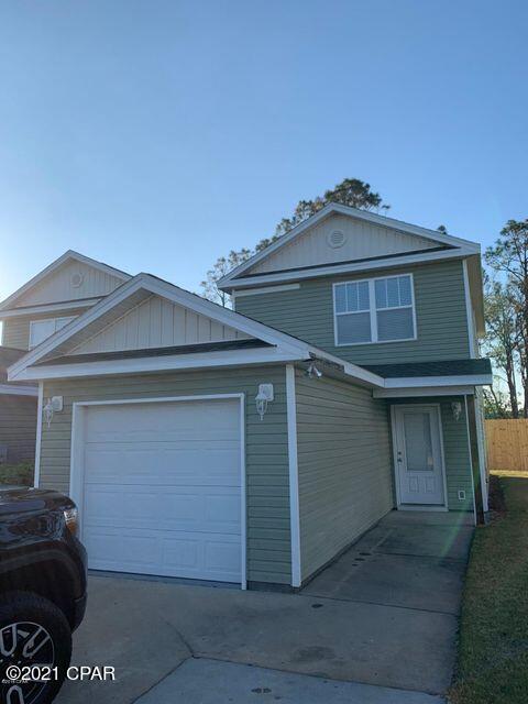 Sterling Cove offers an opportunity to be in a centralized beach location in a gated community with a pool. This townhome is close to the Hathaway Bridge and the Navy Base. The kitchen has plenty of cabinet space and is open to the living room. This unit is nicely equipped having all tile floors except the stairs and bedrooms with all neutral colors. There is a balcony off the master bedroom upstairs and covered porch downstairs with extra storage area.