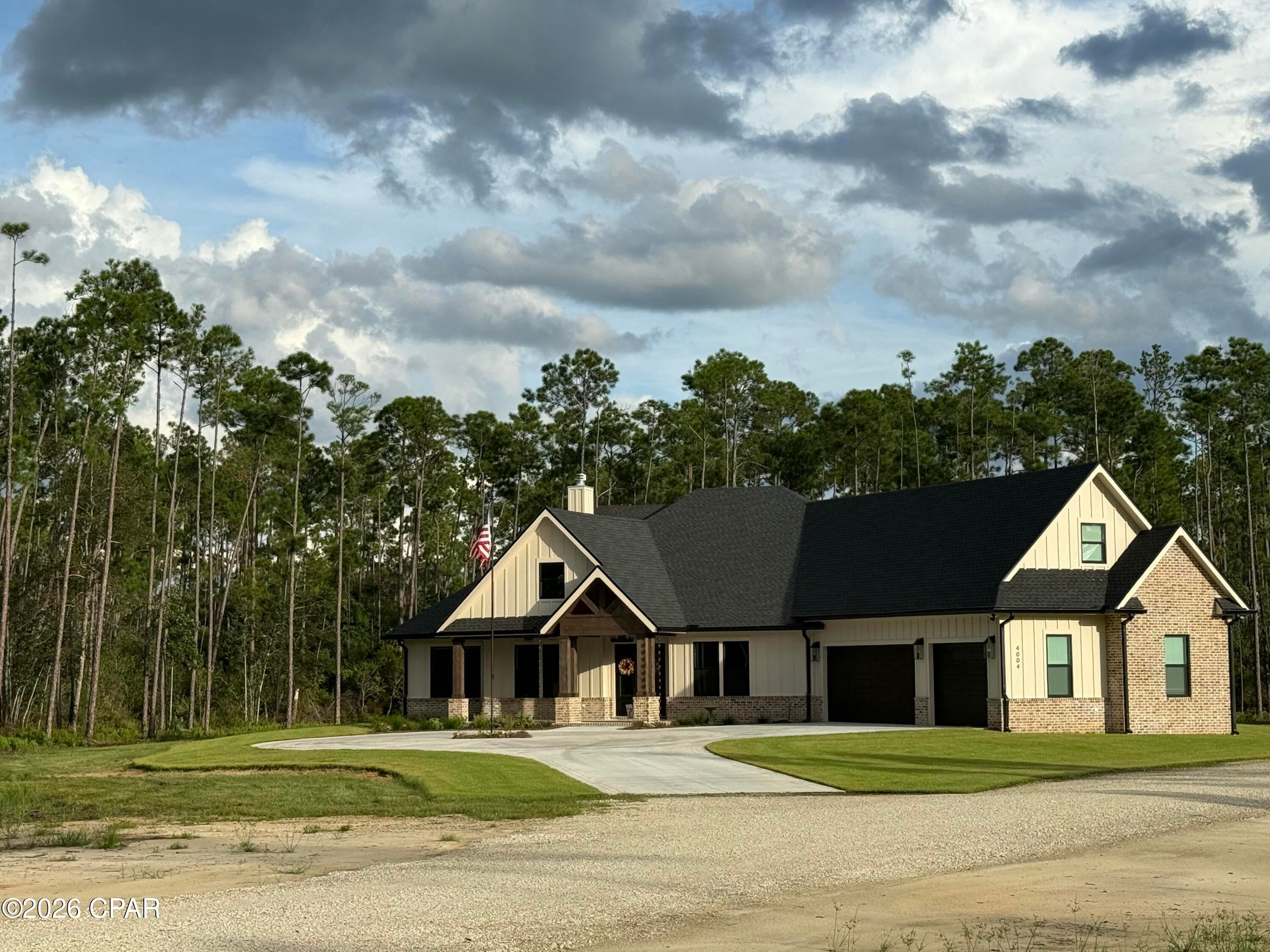 Welcome to 4004 Baxley Bend Road where luxury, privacy, and modern craftsmanship come together on over two and a half beautiful acres in Cedar Creek. This stunning new construction home by Ben Wortman Construction offers 4 bedrooms, 4½ baths, and thoughtfully designed living spaces with custom finishes throughout.
Step inside to an inviting great room featuring soaring vaulted ceilings that create an impressive sense of space and natural light. The gourmet kitchen is a true centerpiece, showcasing high-end stainless steel appliances, quality finishes, and plenty of space for both everyday living and entertaining. LVP flooring flows throughout the main living areas, providing a beautiful combination of style and durability.
Set back from the road on a quiet wooded large lot, this property offers the privacy and peaceful surroundings that are increasingly hard to find. The expansive back patio creates the perfect setting for outdoor entertaining, morning coffee, or simply enjoying the serene natural surroundings.
A spacious three-car garage provides plenty of room for vehicles, storage, and all of your recreational gear. With its exceptional craftsmanship, generous living spaces, custom details, and private acreage, This home offers a rare opportunity to enjoy brand new luxury construction.