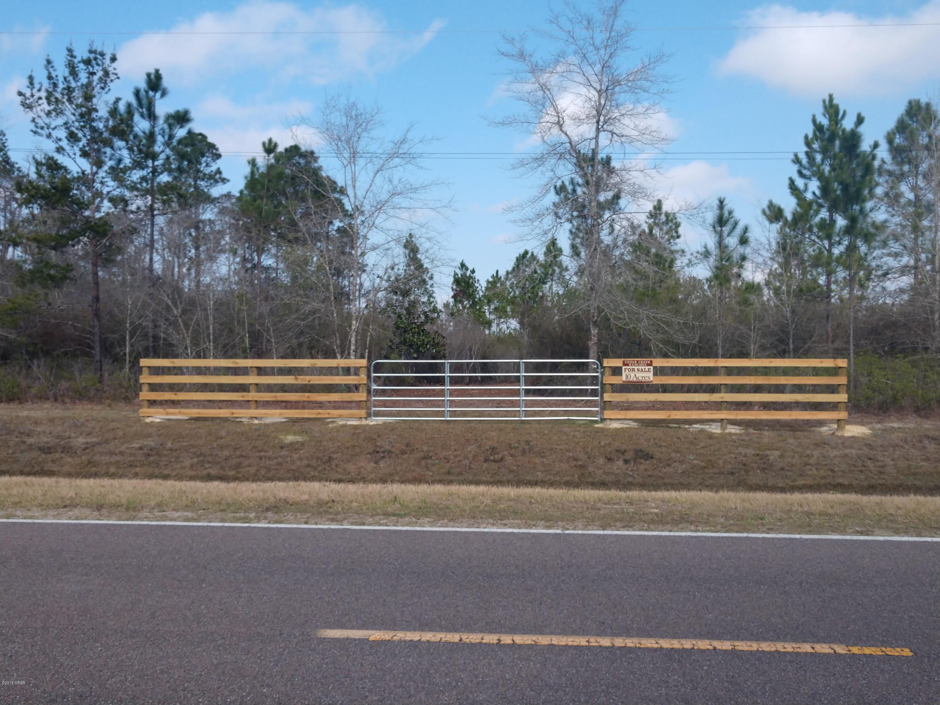 10 acre parcel on Hwy 388. Fully wooded with lots of oaks, large pines on the back of the property. The property has 330′ of frontage on Hwy 388 and is 1/4 mile deep. Great property for hunting, horses, or a secluded homesite 8 miles from Lynn haven and 25 minutes from Pier Park. Cedar Creek Ranches Parcel 7 is 10 acres, please see attached survey for exact dimensions.