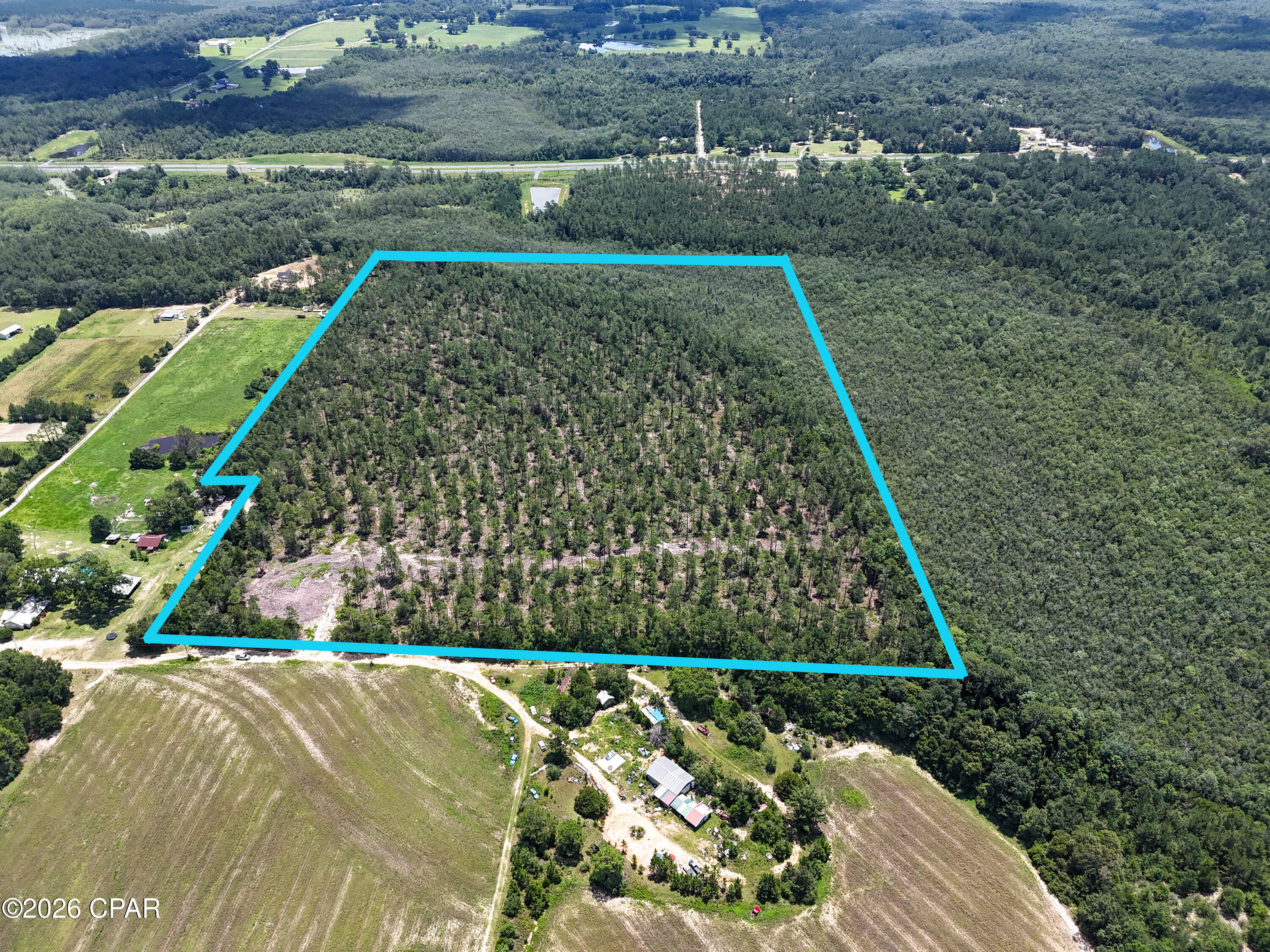 Beautiful 48+/- Acre Tract less than an hour from Panama City Beach! Property has an abundant amount of mature scattered hardwood throughout, and would make a perfect home site or recreational tract. Recent residential cut has opened this property up to give an incredible idea of what it has to offer.