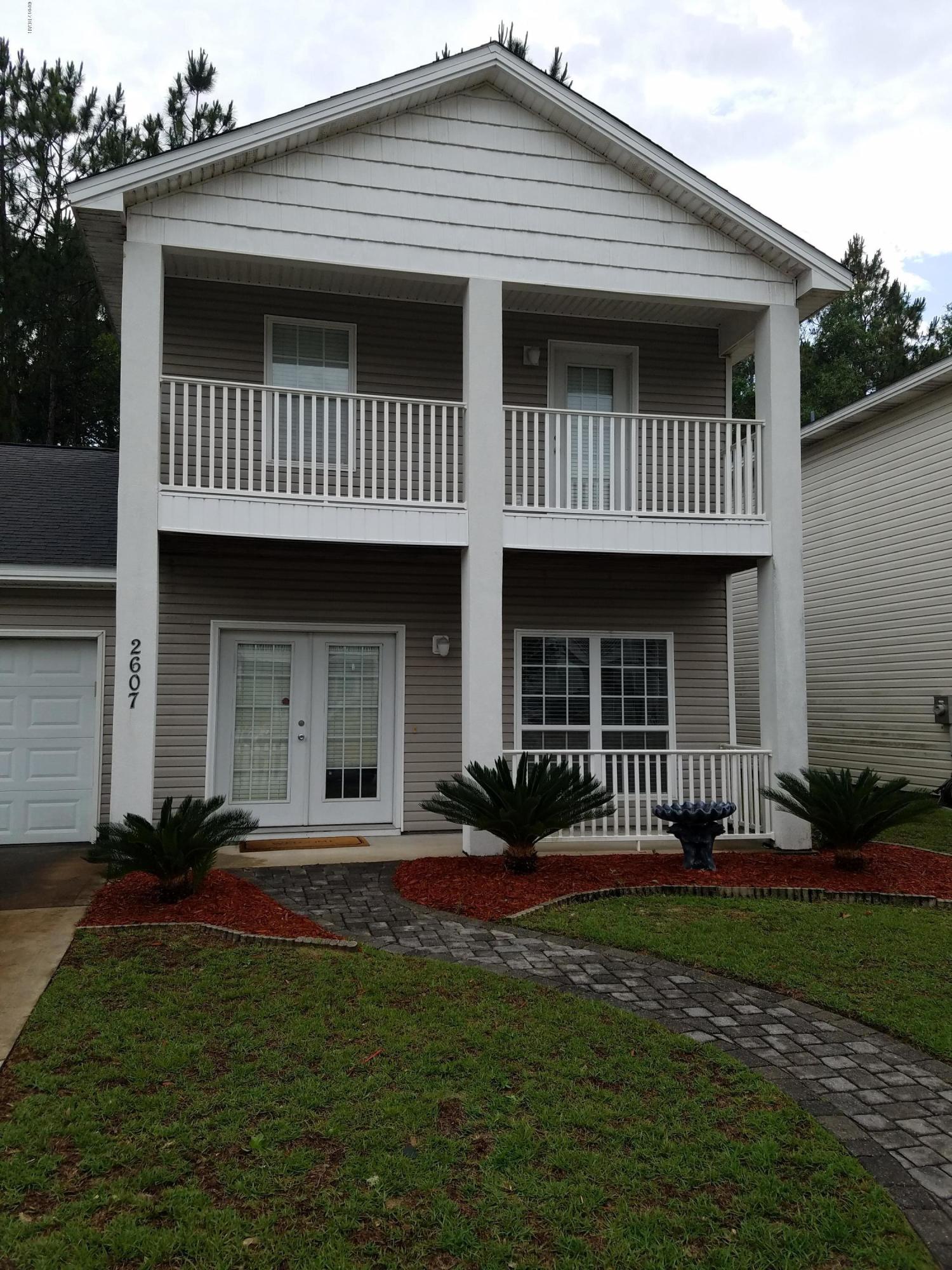 Spacious 3 bedroom 2.5 bath two story home on a Cul-de-Sac. This home offers a garage, large living & dining area,  walk-in closet, inside laundry room,  attic space, and covered balcony off second story master. Pest control (once per year termite bond) included. All sizes are approximate, please measure and verify if important. School assignments are subject to change, please check with Bay County for most accurate information. Pets under 30 lb allowed with owner approval and NON REFUNDABLE pet fee of $250.00 per pet.  Breed restrictions apply.
