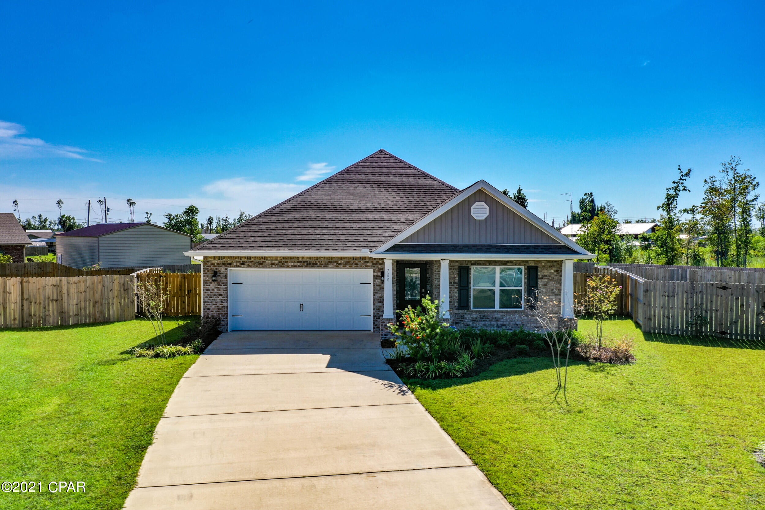 This home is located in the highly desirable subdivision of Andrew's Plantation. The Rhett floor plan features 9'ceilings throughout, luxury vinyl plank flooring throughout the main areas and carpet in the bedroom. The kitchen has a center island with granite counter tops, walk-in pantry and the appliances include smooth top range, microwave and dishwasher. This open floor plan is perfect for entertaining. This subdivision is centrally located near the City of Lynn Haven and is convenient to numerous shopping and dining opportunities.This quaint community offers seclusion, but still provides the opportunity of quick access to HWY 389 and is just a short drive to the Tyndall Air Force Base.