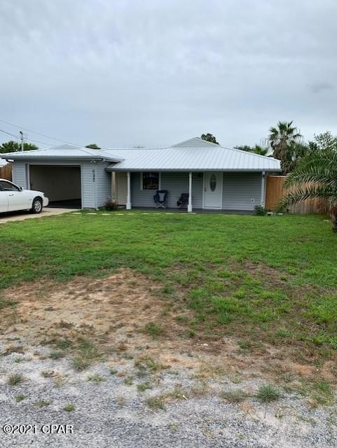'CURRENTLY UNDER CONTRACT, SELLER ACCEPTING BACKUP OFFERS' 

Great Home, Great Location with Drive Through Garage! Pull your watercraft, trailer through the garage for easy storage in the grassy backyard. This well maintained home features a spacious master bedroom, bathroom, new carpet, and good storage. Okay for Short Term Rentals too! It's within walking distance to the Beach, Closest Beach Access- 13, Near Rick Seltzer Park (public parking allowed), several Public Boat Launches along Grand Lagoon and is close to St. Andrews State Park, Restaurants, Marinas, and more... 

All measurements are approximate and should be verified by the buyer.