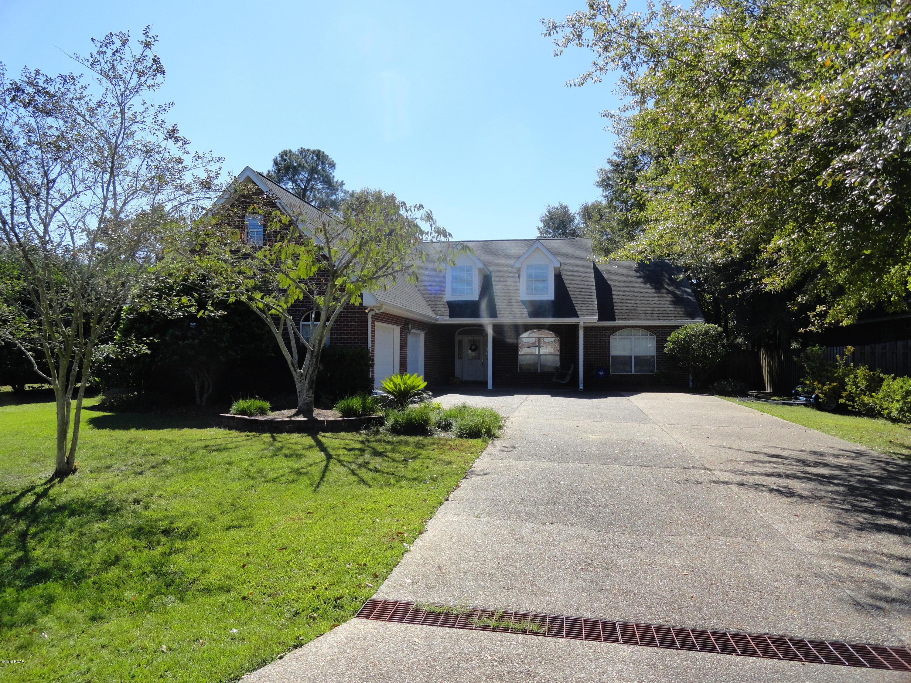 Beautiful all brick custom home in Huntington Ridge built in 2003.  This 3 bedroom 2 bath house is situated close to everything being near the corner of Hwy 390 and Hwy 389.  Home includes a large master suite with 9' x 10' reading/office alcove and large walk in closet.  This split plan home has two guest rooms shared by a double vanity bathroom. There is also an additional 1/2 bath off of the living room.  A gas stove and water heater are great for efficiency. The living room is a great room that opens into a kitchen/dining area with a breakfast bar.  There is also a formal dining room as well.  French doors open up to a patio and sizeable fenced backyard.  The garage has space for 2 cars, but is oversized and has tremendous space for storage.  The driveway is generous for extra parking.