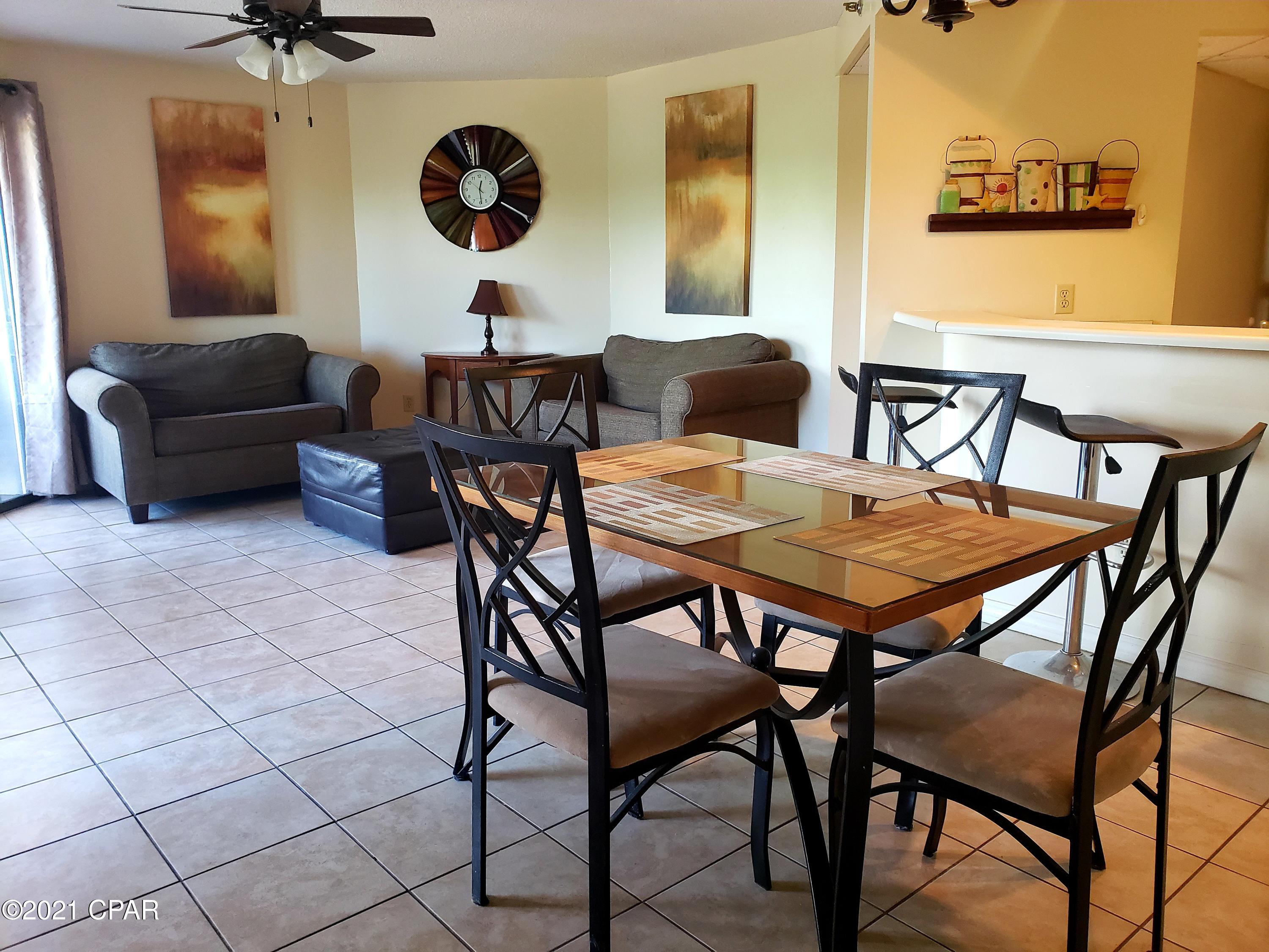 Nice, spacious One Bedroom One Bath 840 sq. ft. .  All tile except master bedroom is carpeted. Walk in closet, Large extra, or owners closet at entry hall. 

Unit is furnished. This is a gated waterfront community. with a pool, tennis courts, community room , a boat dock with gulf access. It is a short walk across the street to the beach.  Close to shopping and attractions. Easy to show.