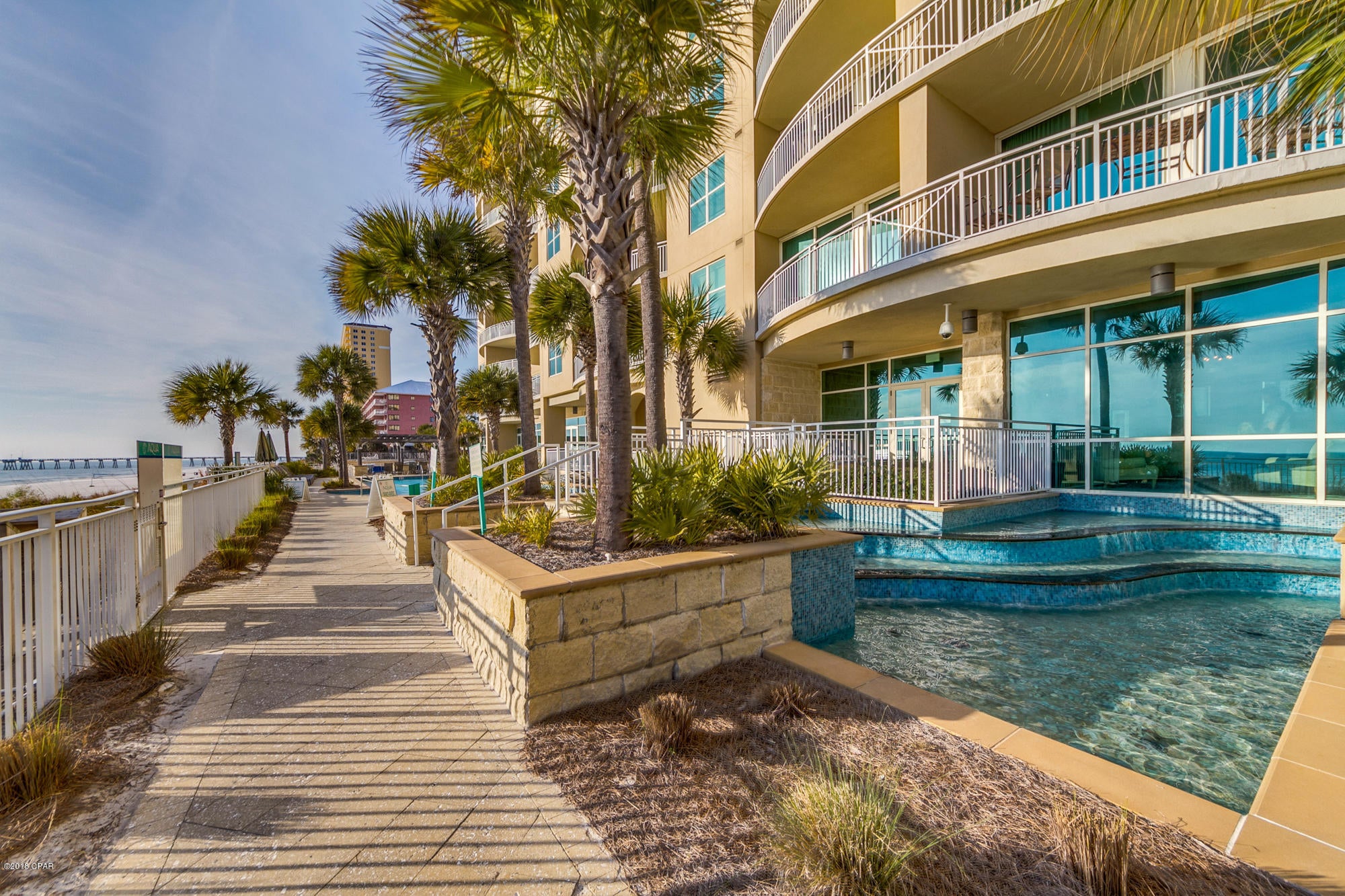 Rising 22 stories above the sugar white sands of Panama City Beach, Aqua commands the most spectacular location on Florida's famed Emerald Coast. It was the developer's intent to design Aqua to standards that all Panama City Beach resorts would be measured. Iconic architecture, an array of resort amenities, and a true connection to the water blend beautiful design and creative living. All in the perfect location along the perfect beach. This 3 BR 3 Bath w/bunk condo has a spacious living area with 2 sliding glass doors opening to the balcony, with 42 feet of gorgeous Panama City Beach in front of you. One of the most popular 3 BR floorplans on the beach, this condo will be a monster rental! Community Bank manages AQUA's reserve account and will provide financing. This condo won't last long