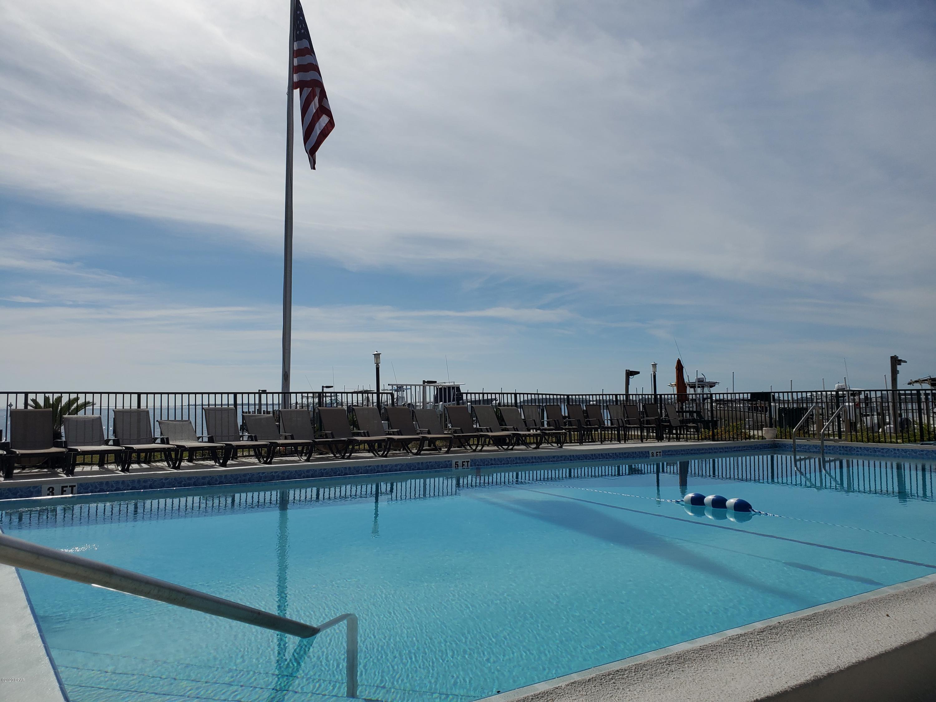 Available for 6 Month lease term! Beautiful, newly furnished 2 BR, 2 BA condo overlooking St. Andrews Bay! Enter this immaculate condo into the living room where you can sit back and relax watching TV and the sunset at the same time. There's a balcony to really capture the waterfront views as well. Kitchen comes fully stocked; The unit features a spacious master bedroom w/ king bedroom suite and en suite bathroom with tub/shower combination. The 2nd BR has a queen bedroom suite and bathroom across the hall. Landmark Condominiums offers a gorgeous landscaping, bay front pool, north side pool, private beach and clubhouse with outdoor pavilion great for entertaining! Walk to some of local's favorite restaurants, barista and taproom!