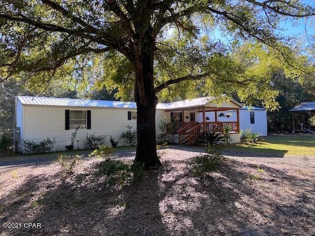 >>>'CURRENTLY UNDER CONTRACT, SELLER ACCEPTING BACKUP OFFERS' <<<

Quiet Country Living located at the end of the road offers plenty of privacy.  This 2006 (16x92) 3 bedroom 2 bath single wide mobile home  with back addition has both front and back porches to relax on. 

The 2 (16x24) enclosed outbuildings built on site, as well as a open pole barn (24x36) and shipping container (8x40) offers alot of extra space for storage or workshops.  This 5 acre parcel is completely fenced and also includes fruit trees,grape vines, blueberry bushes and wonderful shade trees.  All Appliances including Washer and Dryer convey.  Make your appointment today.  All sizes are approximate, buyer must verify if important.
