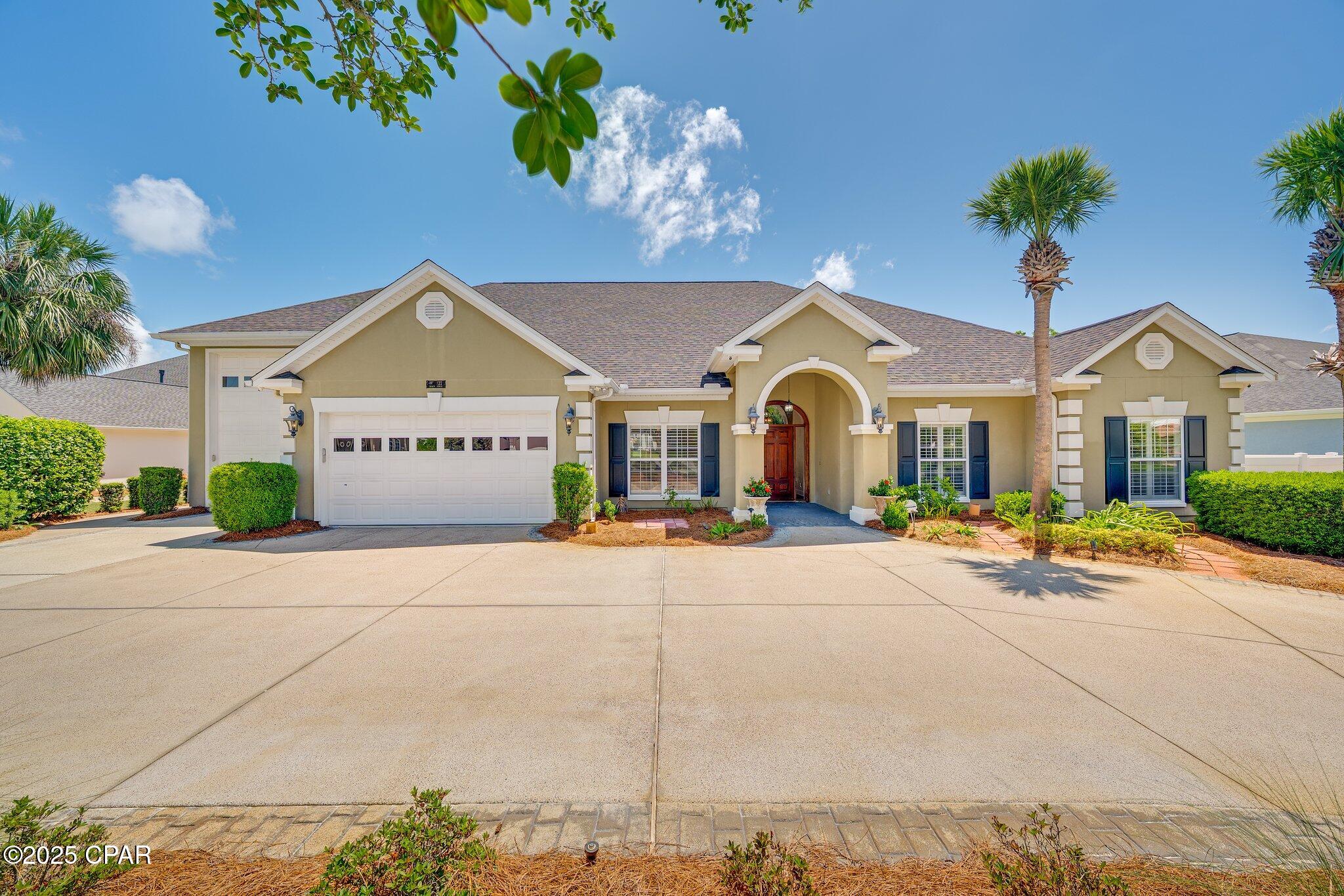 Entered for comp purposes.  Experience exceptional living in this custom home located in the prestigious gated community of Bay Point. Perfectly positioned on the 11th hole of the renowned Nicklaus Golf Course, this meticulously maintained residence offers a rare blend of luxury, function, and privacy. Featuring 3 bedrooms, 2.5 bathrooms, and a dedicated office or study that can serve as a fourth bedroom, this home provides flexible space for both living and working.

Step inside to find hardwood floors, raised ceilings, recessed lighting, and a cozy gas fireplace--all integrated with a Control4 smart home system. The spacious kitchen boasts stainless steel appliances, a wet bar, and flows effortlessly into the open living and dining areas, perfect for entertaining. Plantation shutters add charm throughout, and a second-floor bonus room offers extra space for a media room, playroom, or guest retreat.

The expansive master suite overlooks the beautifully landscaped backyard and golf course, with a master bath featuring a double vanity, garden jetted tub, separate shower, and a large walk-in closet connected to a full laundry room with mud sink.

Outdoors, enjoy an oversized screened-in covered patio with tongue and groove ceiling and recessed lighting, leading to a heated swimming pool with a tranquil waterfall. The oversized 180-foot-deep lot allows ample space to relax or entertain.

Car enthusiasts and adventurers will love the standard 2-car garage plus a massive 900 plus square feet heated and cooled motorhome garage--built to house an RV or boat up to 45 feet. This specialty garage includes 30-amp power, sewer clean out, ventilation, and a workshop area.

Additional features include a full-house generator, 16-camera security system, and the peace of mind that comes with living in one of Panama City Beach's most sought-after gated communities. This is Bay Point living at its finest.