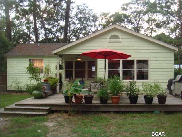 Custom Cove Home- This home is 1200 square feet of luxury! Originally built in 1942, but completely renovated in 2006. The open floor plan makes the home perfect for entertaining, the restored hardwood floors, the GE Stainless steel appliances, the built in wine rack, the granite countertops, the custom cabinets, and the Jacuzzi Tub is among the few, of the large list, of luxury amenities that the home has to offer. The large fenced in backyard and the large deck also make a perfect spot to enjoy the warm Florida weather.