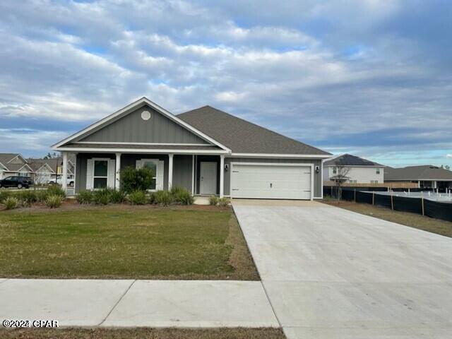 Bridge Harbor!  Elegant 4 bedroom 2.5 bath with climate controlled sunroom and oversized 2 car garage.  This home sits on a large corner lot.  Home features SMART HOME SYSTEM, LVP flooring throughout common areas and carpet in the bedrooms, split bedroom floor plan, large kitchen with stainless appliances, island breakfast bar, master bedroom suite, laundry room and large covered patio.  The garage is climate controlled with a 3 way split Carrier a/c unit.  Community Pool, sidewalks and mailbox.  All Electric, sprinkler meter on separate meter.  
NO SMOKING ON PREMISES
1-Small Dog under 20 lbs.
$50.00 Pet Fee, $250.00 Pet Deposit and $50.00 per month pet rent.