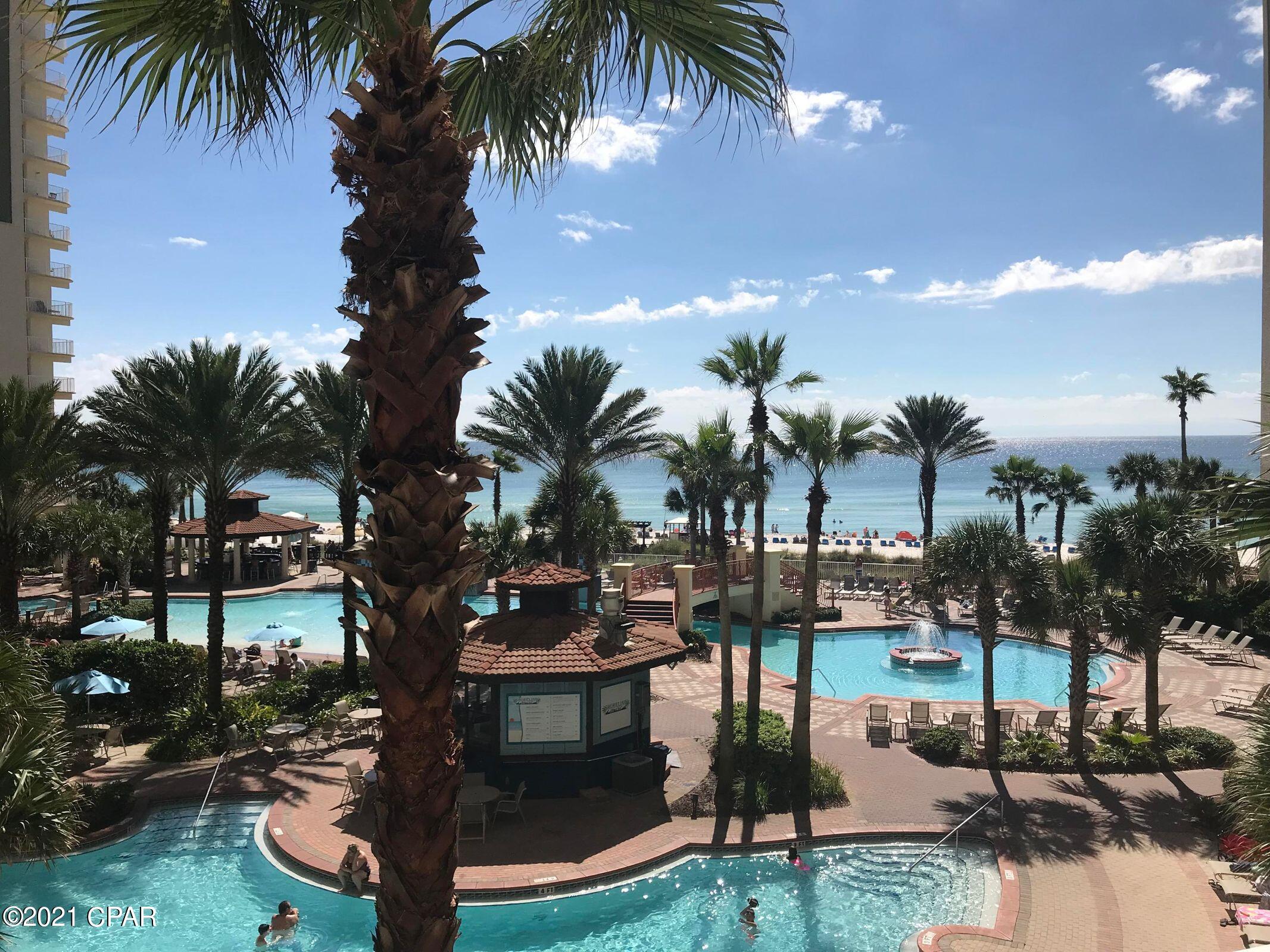 Great 2 bedroom/3 bath unit with bunks on lower floor. Includes Deeded parking spot on the 9th floor, park your car and walk to unit, no elevators needed.  Shores of Panama offers resort style amenities including 13,966 SF Gulf side pool and hot tub, large heated indoor pool & hot tub, health and fitness center, sauna, massage therapy and steam room, 2 tiki bars serving lunch and dinner, also Donut, coffee and ice cream shop, pizza parlor, meeting spaces, covered parking deck.