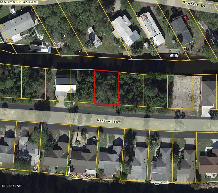 Beautiful Canal front Homesite on Harbour Blvd. Seawall is already in place. Ready to Build! Easy access to the Gulf of Mexico and Shell Island. Harbour Towne is a gated community with amenities that include two pools, tennis courts and a clubhouse.