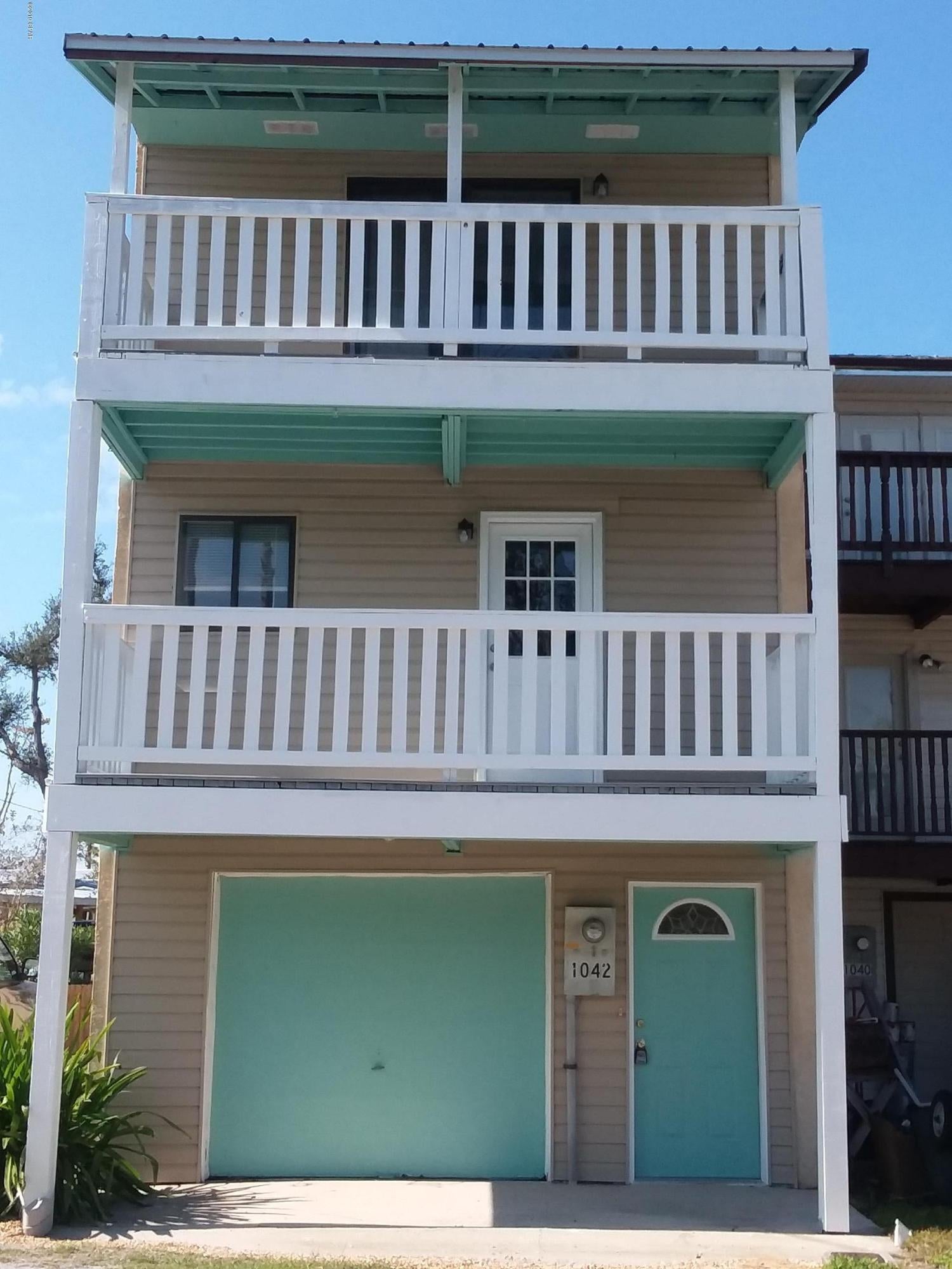 Beautiful View!  2bd 1.5ba Remodeled townhouse Four balconies, water views! W/D hook-up. 1 car garage. Three stories. No pets.