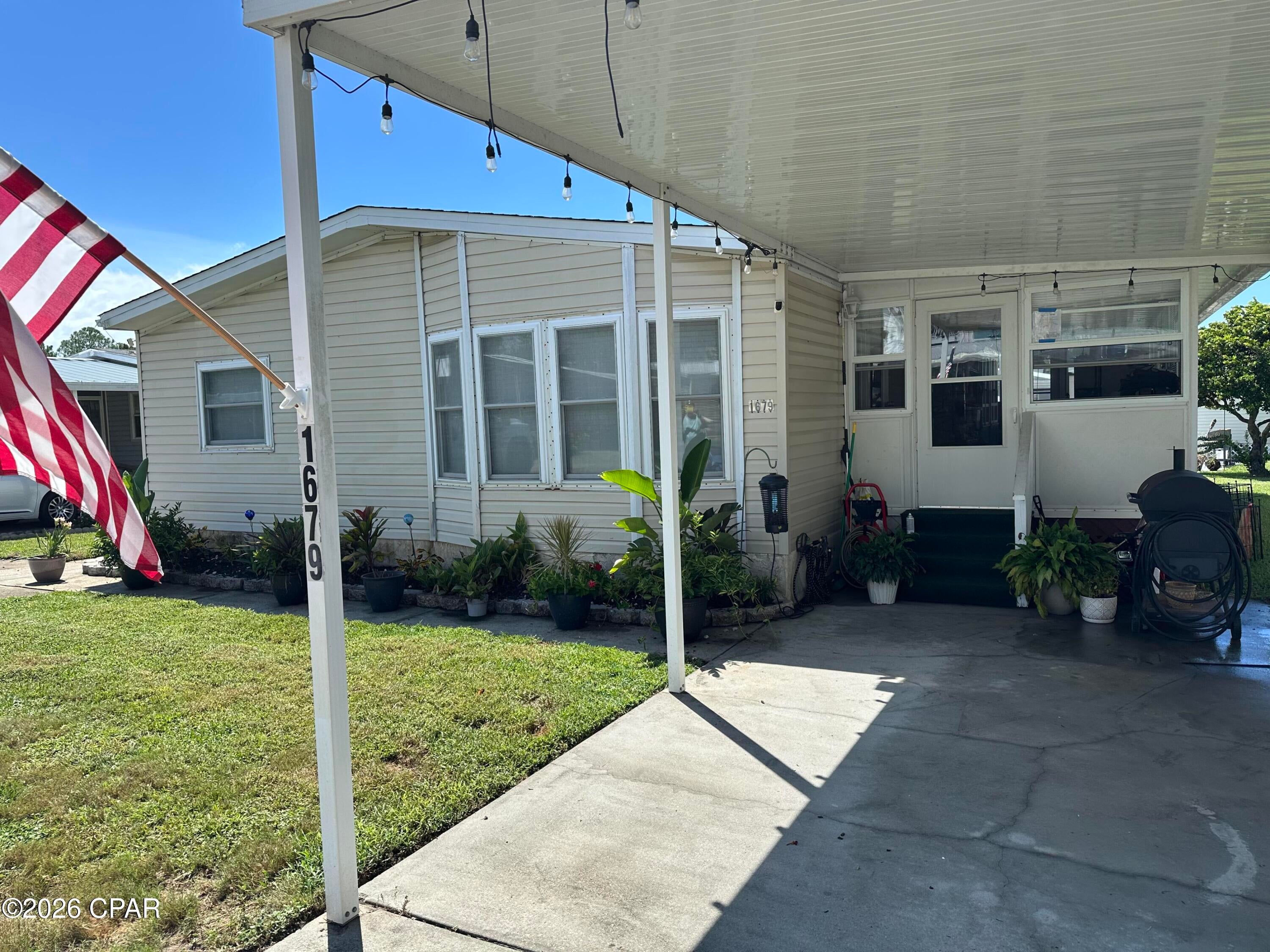 Welcome to 1679 Acre Cir, a charming mobile home located in Panama City Beach, FL. This spacious property features a comfortable and inviting living space with three cozy bedrooms. Boasting a generous living area of 1,456 square feet, this home provides ample room for relaxation and entertainment. Situated on a 0.136-acre lot, the property includes outdoor space for various activities or potential landscaping projects. Located less than 2 miles from the beach, this home has convenient access to the vibrant local area.