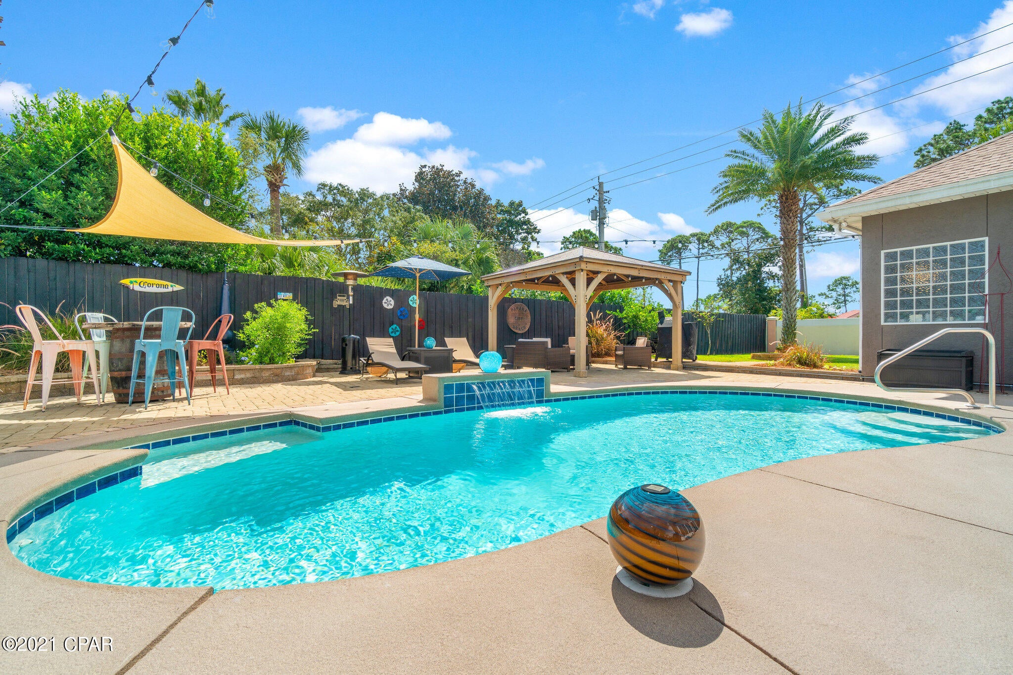 Beautiful 3 bedroom 2 bath executive Palm Bay home with a pool and lots of recent upgrades! This home features an open floor plan, enormous kitchen with breakfast bar and eat in dining, separate dining area, large master bedroom with good sized master bath, walk-in closets, a standalone shower with separate bath tub, beautiful saltwater pool, fenced back yard, a large 2 car garage and a wonderful sun room for relaxing. This home boast gorgeous archways & columns with 10 & 12 ft ceiling with crown molding. The guest bedrooms share a Jack & Jill bathroom. The landscape is well done with a sprinkler system with separate well for irrigation. Recent updates include a 2020 roof, A/C, kitchen appliances, water heater, pool equipment, pavers, wood look tile, paint, toilets, and so much more! All ages, room sizes and measurements are approximate. Please verify if important.