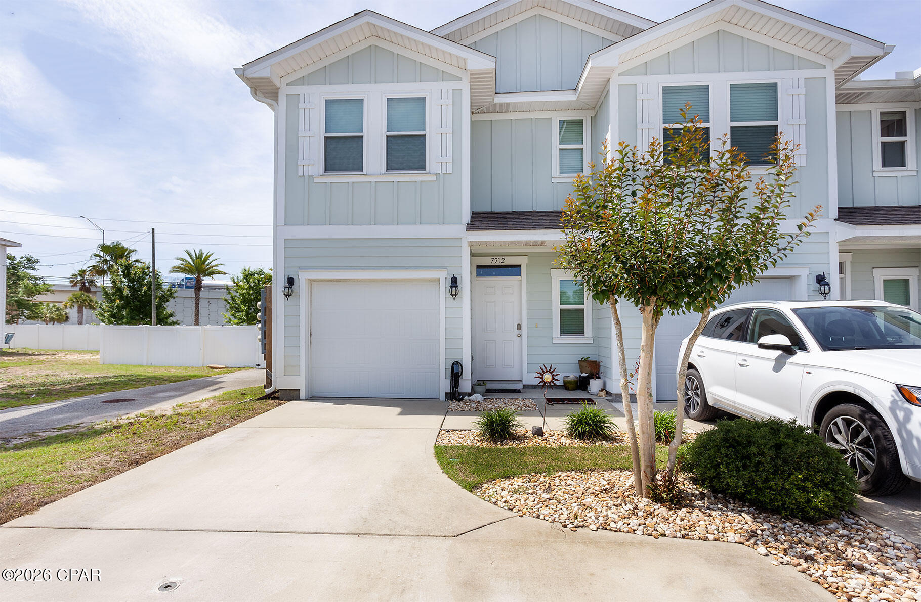 END UNIT, SHORT TERM RENTALS ALLOWED, AND UPDATES! Here is the perfect townhome in PCB. This 3 bedroom 2.5 bath boasting a new A/C unit and impact doors and windows. These upgrades allow you more energy efficiency while you are cool and comfortable. The impact windows and doors also reduce noise and gives you peace of mind. As you enter you will find an open main living area with a half bath and garage. There is a lot of natural light in this end unit. As you enter the fence backyard, you will find a private oasis with a deck and entertaining area. Up stairs you will find the owners suite and private bath along with two additional bedrooms, an additional bathroom, and laundry area. The location is perfect only a short drive to the beach, restaurants, shopping, grocery stores, the navy base and more. The home has granite countertops, stainless steel appliances and a washer and dryer. Hathaway townhomes allows STR, HOA fees includes a resort style pool, lawn care, and trash pickup, making it low maintenance as well.