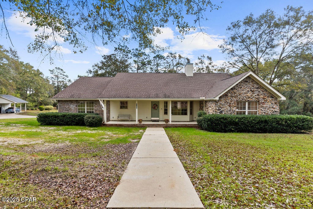 Welcome to 1488 Daisy Lane in Bonifay--your own peaceful retreat tucked away at the end of a quiet, wooded lane. This charming property offers the perfect blend of privacy and convenience, located just minutes from I-10 and Memorial Field. Shaded by mature trees and featuring a sparkling in-ground pool, this home is perfect for relaxing weekends, outdoor entertaining, and everyday comfort.

Step inside to discover a spacious layout offering four bedrooms, three and a half bathrooms, plus an additional bonus room that can easily function as a fifth bedroom, office, or hobby space. The inviting family room and kitchen open onto a large covered back porch that spans the width of the home--ideal for morning coffee, evening gatherings, or simply unwinding while enjoying the peaceful views.

The thoughtfully designed laundry room is located near the master suite and includes ample countertop space, a sink, and room for a freezer. The home is equipped with two AC units, including a recently updated HVAC system, all-electric appliances, and a cozy wood-burning fireplace that is already set up for gas if desired. Convenience continues with front exterior outlets controlled from inside--perfect for holiday lighting or outdoor décor.

Outside, you'll find a spacious storage building with electricity and water. This structure measures 24x22 under roof, with approximately 24x12 fully enclosed, providing excellent space for tools, equipment, hobbies, or additional storage.

From the inviting indoor features to the serene outdoor amenities, 1488 Daisy Lane offers a rare combination of comfort, functionality, and tranquility. Don't miss your opportunity to make this beautiful property your own private getaway!