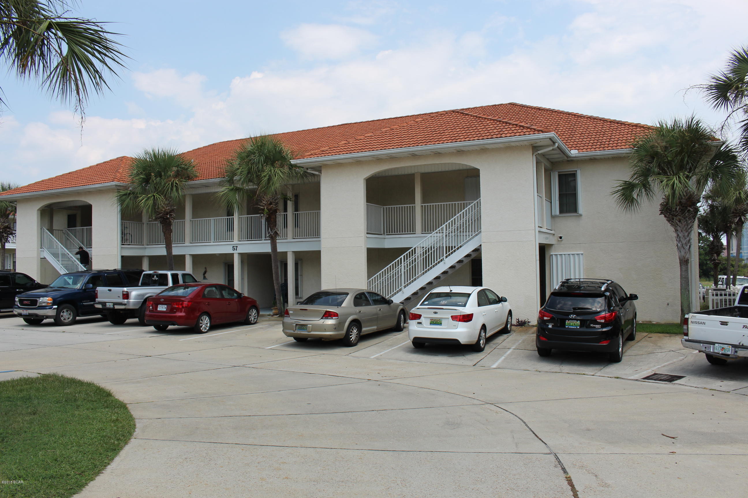 The beautiful neighborhood community of Horizon South.  This complex includes four pools, putt putt golf, tennis courts, shuffleboard, a community room with a pool table, workout facility, rental and association offices onsite, and direct beach access across Front Beach Road.  This 1-bed 1-bath fully furnished condo is on the second floor of the building right before the gate on Front Beach Road.  Make an appointment to see it today!