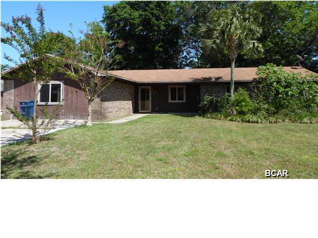 This is a large, brick home, with an additional detached office/storage building in the back yard. This home boasts 4 bedrooms and 3 baths, with an open kitchen/dining floorplan. The garage has been converted into a large master suite, plus there is another bedroom with private bath at the other end of the house. The kitchen has granite countertops that extends from the backsplash all the way up to the tall upper cabinets. French doors lead from the den to the big back yard. The outdoor office/storage space is finished on the exterior, with access doors, one facing the front of the house and one facing the rear of the house. The interior is a blank slate, easily transformed into a home office, man cave or playroom. (All info is approximate. Buyer to verify any info that is