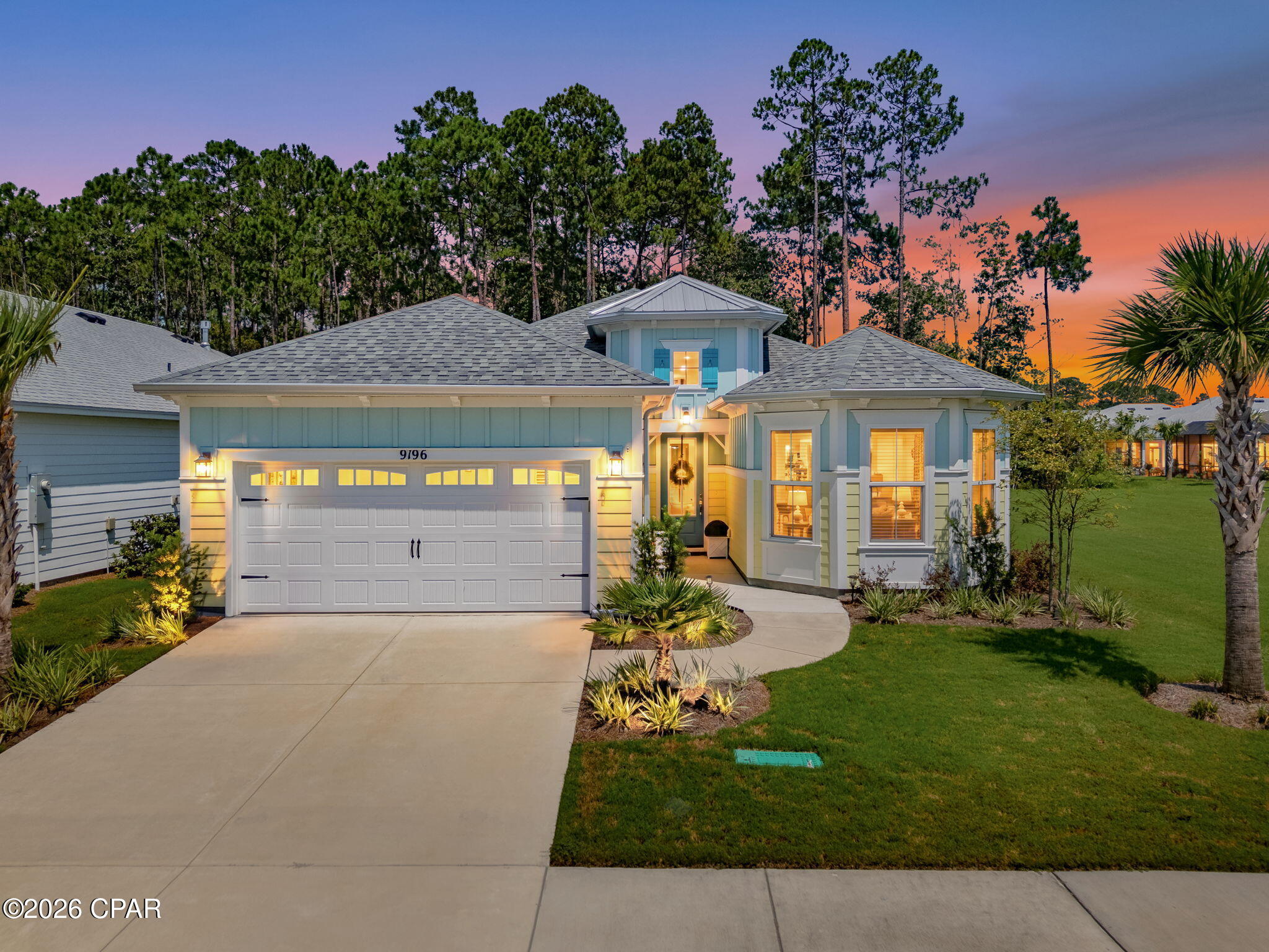 Gorgeous and one-of-a-kind SEASHELL floorplan in PHASE 5 with $250,000 in Upgrades!  Welcome to easygoing coastal living in Latitude Margaritaville Watersound! Located in desirable Phase 5, this beautifully appointed 3-bedroom +den, 2,114-square-foot home offers the perfect blend of resort-style relaxation, exquisite design, and exceptional livability. From the moment you arrive, the private preserve setting creates a peaceful private backdrop. The lot also offers abundant side-yard space and a private preserve view.  This adjacent vacant lot is non-buildable due to underground culverts to watershed which guarantees your privacy forever!

Inside, an inviting open floor plan is enhanced by crown molding at the kitchen, stunning ceiling fans, pendant lighting, chandeliers, recessed lighting throughout every room and the lanai, and blinds throughout. The gourmet kitchen is designed for both entertaining and everyday enjoyment, featuring Level 2 Colada cabinetry, finished end panels on the kitchen cabinets and island, Level 3 quartz countertops, a 30-inch refrigerator enclosure panel, gas cooktop with hood, wine cooler, extended island, pullout pot-and-pan drawers, under-cabinet lighting, and 8' doors throughout the home.

The private primary suite provides a true retreat with 2 custom closets with outlets, dual vanities, a zero-entry shower, and a relaxing soaking tub. Two guest bedrooms share a convenient converted shower bathroom. The den offers flexible space for an office, hobby room, or additional retreat, while a custom shiplap wall and electric fireplace add warmth and character to the living area.

Outdoor living takes center stage with a saltwater pool with a mesmerizing waterfall, gas stub-out, enclosed in a beautifully appointed lanai that is ideal for morning coffee, afternoon entertaining, or unwinding at the end of the day. Practical features include a whole-house water filtration system, upgraded internal hot-water circulation tankless hot-water heater, laundry room cabinetry, WiFi-enabled belt-drive garage door opener, utility sink, attic storage build-out, extra storage racks in the garage, epoxy garage floor, 20-amp garage outlet, a brass floor receptacle, high TV outlets in the primary suite, den, great room, and lanai, five exterior GFI outlets, and two switched exterior flood lights. The remaining five-year protection plan on the LG washer and dryer and Samsung Bespoke refrigerator provides added peace of mind. Designer touches continue throughout with custom mirrors and a carefully selected whole-house paint palette featuring Alabaster, Canvas Tan, Urban Putty, and Khaki Shade.  For added peace of mind, the owners recently had a full independent inspection completed in March.

Latitude Margaritaville Watersound residents enjoy an amenity-rich lifestyle centered around Latitude Town Square, including the Paradise Pool, Fins Up! Fitness Center, indoor lap pool and spa, pickleball and tennis courts, bocce, walking trails, kayak access, live entertainment, dining, the Last Mango Theater, and Workin' N' Playin' Center. The adjacent Watersound West Bay Center is under development and is planned to add a convenient mix of retail, dining, office, and medical services, with Publix confirmed as an anchor tenant.

This is more than a beautifully finished home--it is an opportunity to enjoy privacy, outdoor living, and the carefree Latitude lifestyle in one exceptional setting.